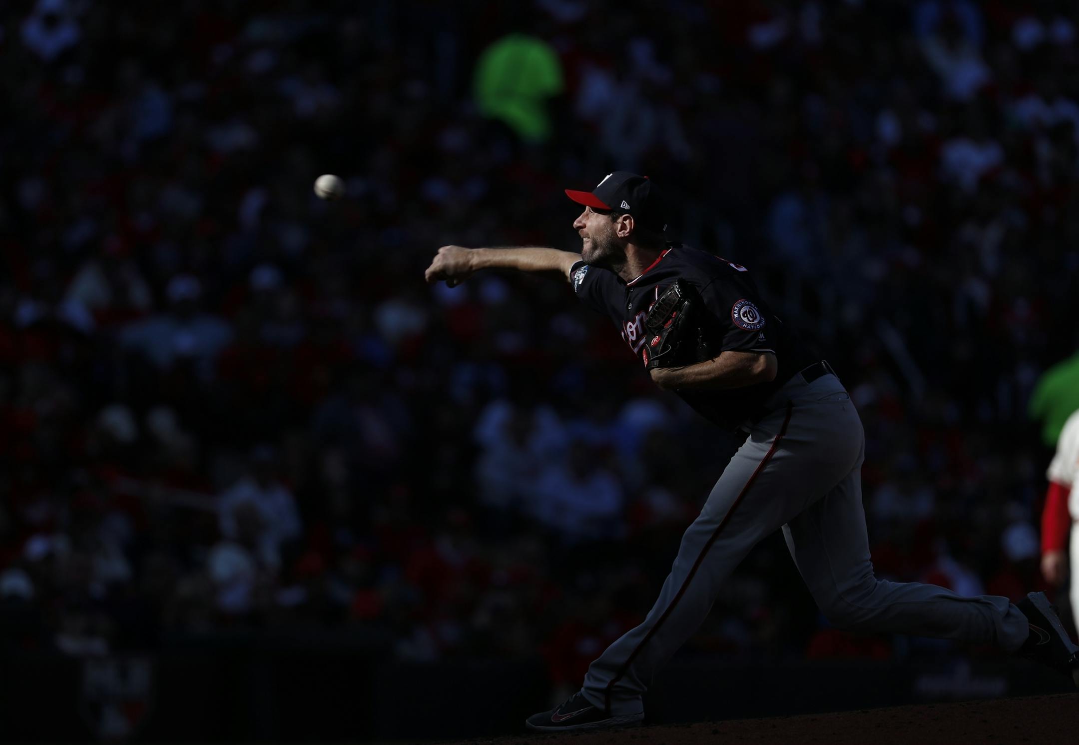 Washington Nationals starting pitcher Max Scherzer throws during the second inning of Game 2 of the baseball National League Championship Series against the St. Louis Cardinals Saturday, Oct. 12, 2019, in St. Louis. (AP Photo/Jeff Roberson)