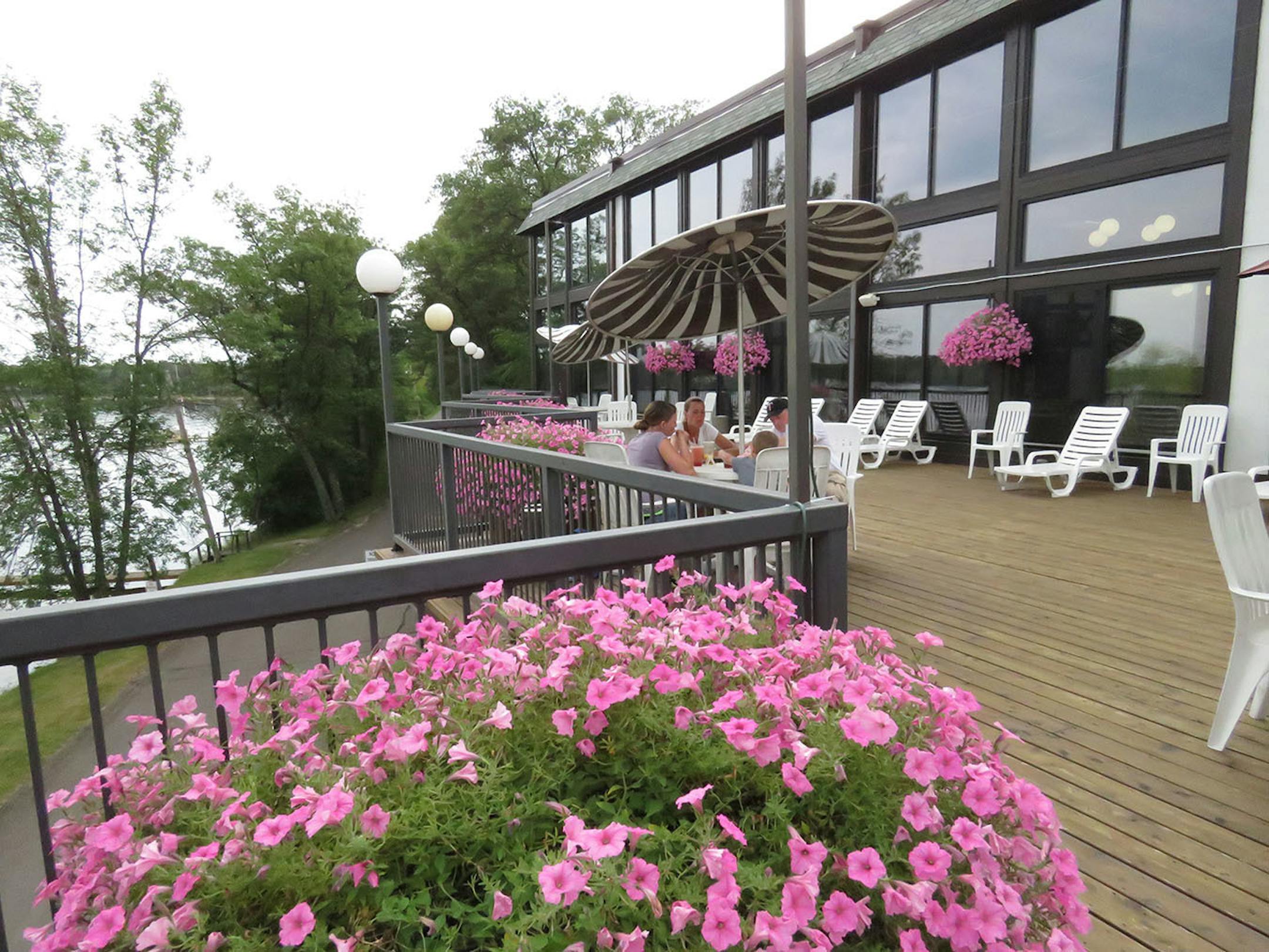 Cragun's sun deck outside its spacious indoor pool area offers a popular place to lounge and watch the action on Gull Lake.