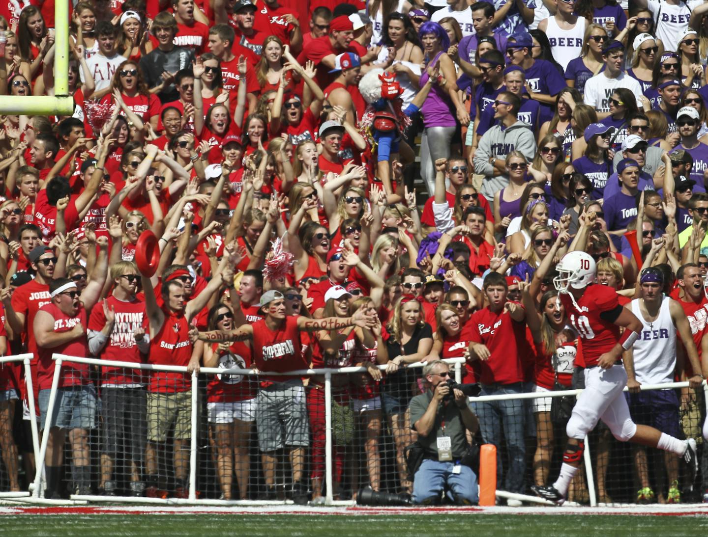 The longstanding St. John's-St. Thomas rivalry heats up every time the schools play football, as it did here in 2012 in Collegeville.