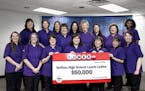 Caption: The lunch ladies from Buffalo High School claimed their prize at Minnesota State Lottery headquarters on Tuesday in Roseville. Credit: Provid