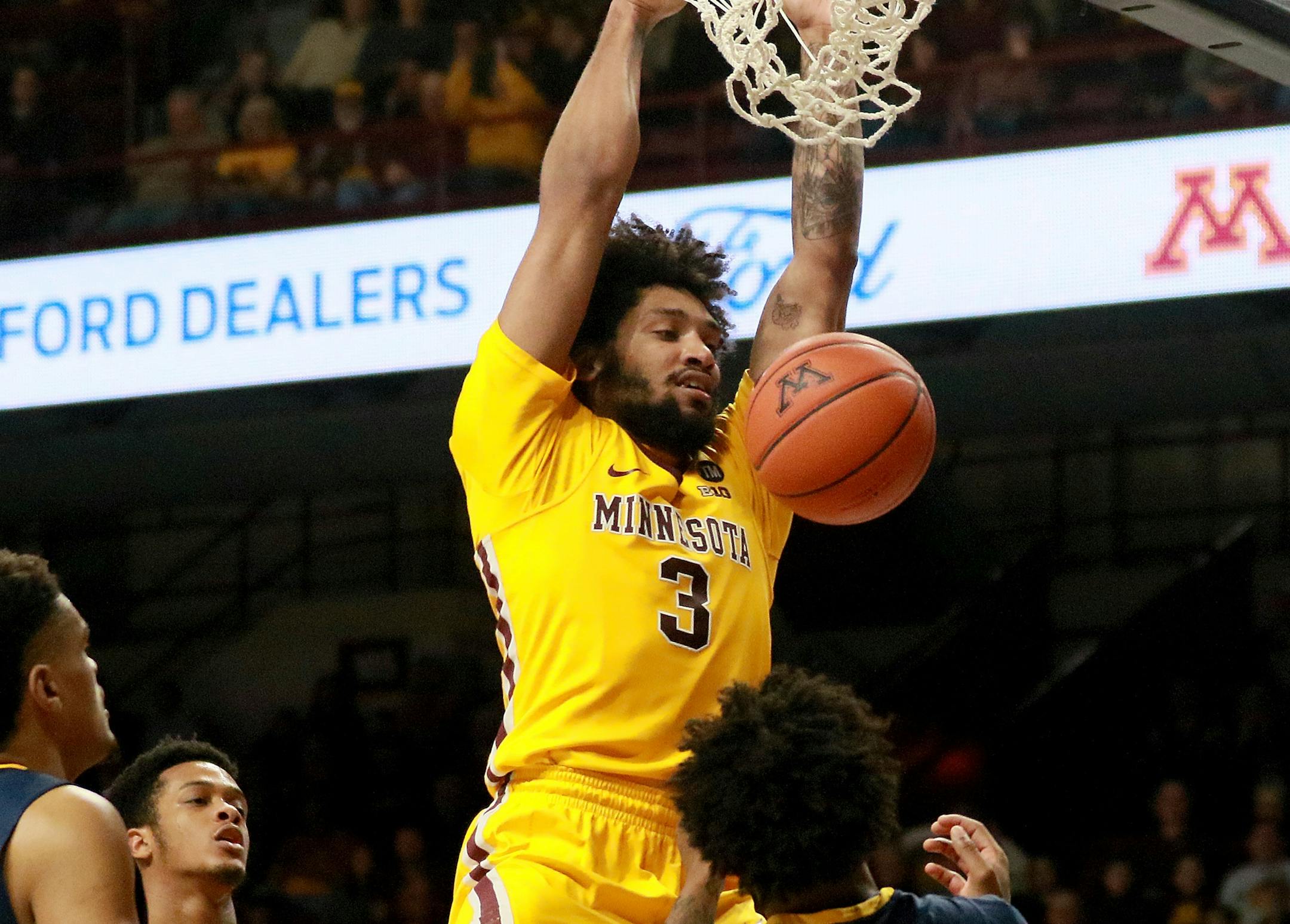 Minnesota's Jordan Murphy (3) dunks during the first half against North Carolina A&T on Friday, Dec. 21, 2018, at Williams Arena in Minneapolis. (David Joles/Minneapolis Star Tribune/TNS)