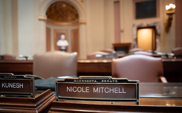 DFL state Sen. Nicole Mitchell was absent from the State Capitol on Wednesday after being charged with first-degree burglary a day earlier.