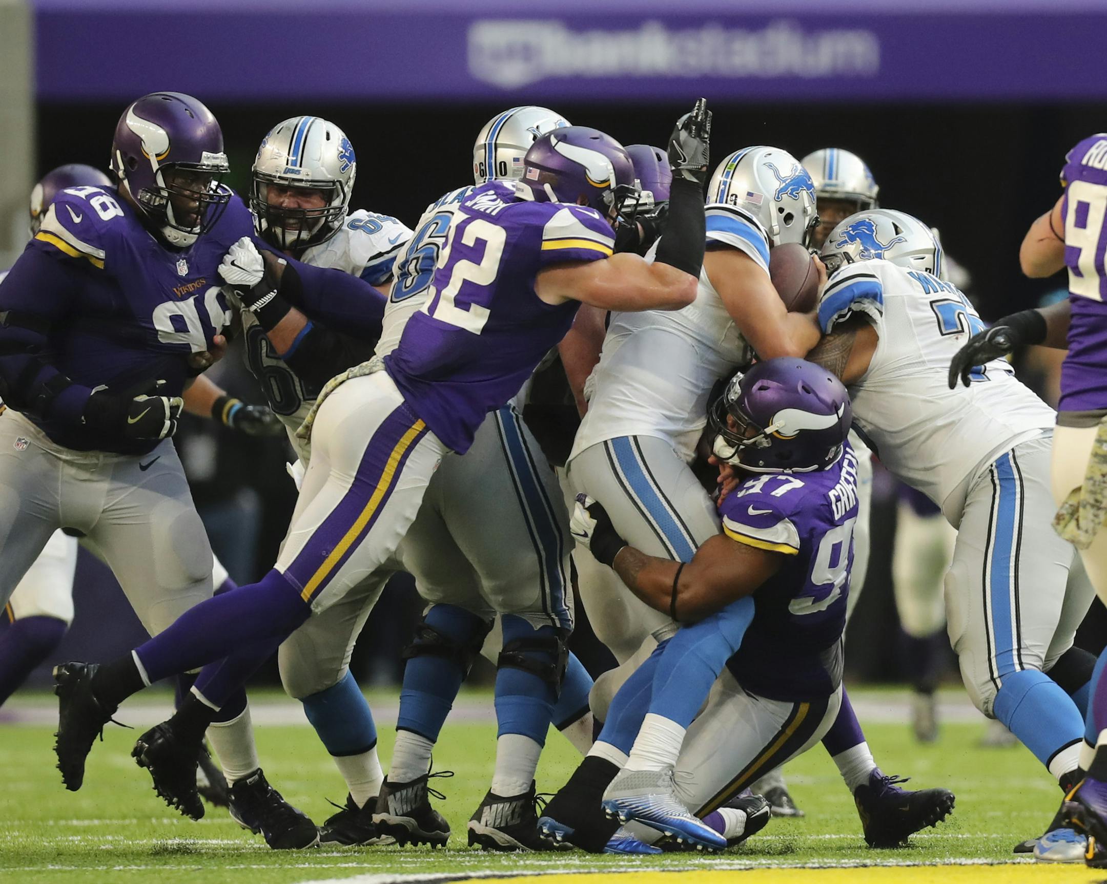 Detroit Lions quarterback Matthew Stafford (9) was sacked for a five yard loss by Vikings defensive end Everson Griffen (97) on the Detroit's scoring drive in overtime. ] JEFF WHEELER ï jeff.wheeler@startribune.com The Minnesota Vikings lost to the Detroit Lions 22-16 in overtime of their NFL football game Sunday afternoon, November 6, 2016 at U.S. Bank Stadium in Minneapolis.