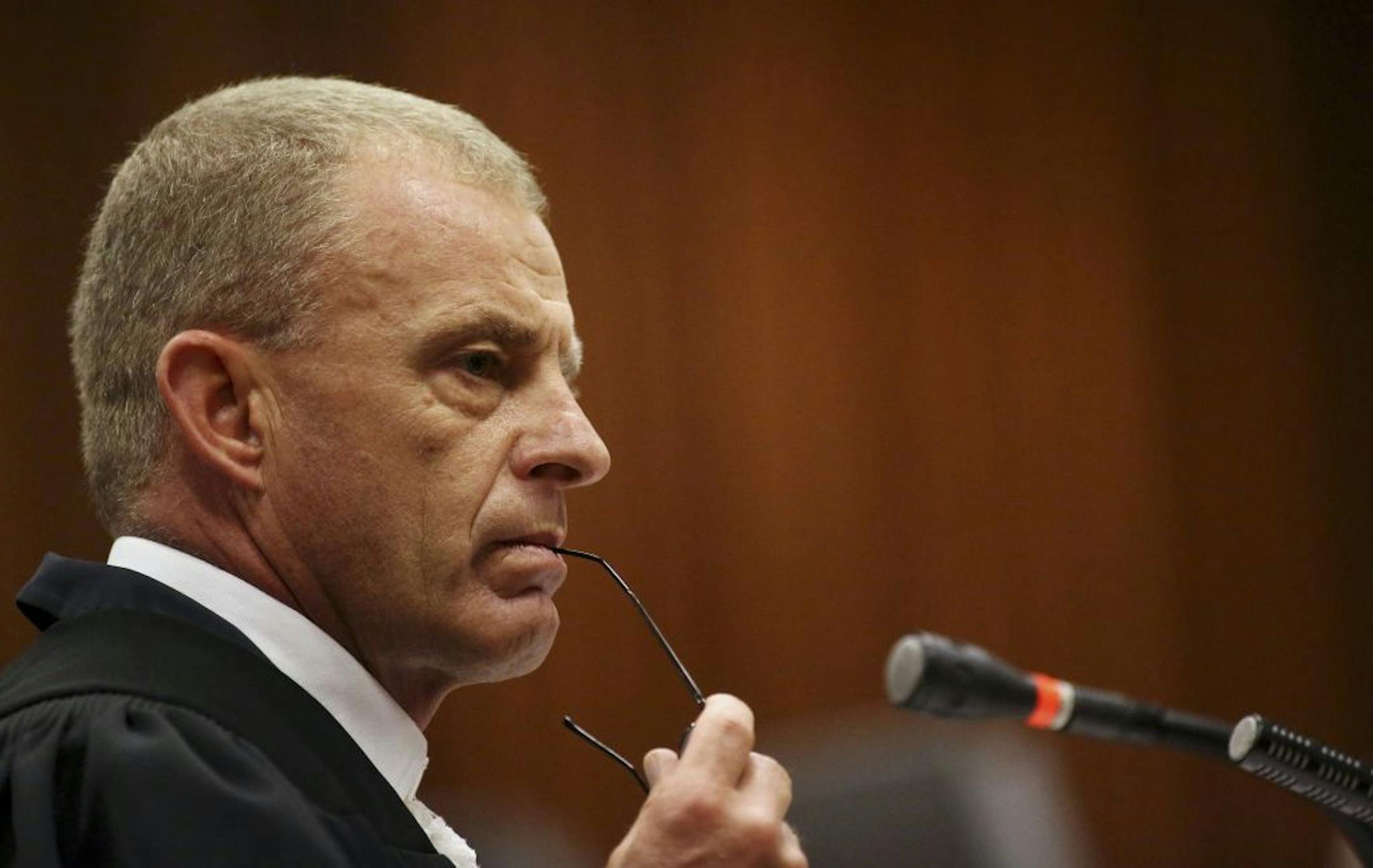 State prosecutor Gerrie Nel during cross questioning of Oscar Pistorius, in court in Pretoria, South Africa, Wednesday, April 9, 2014.