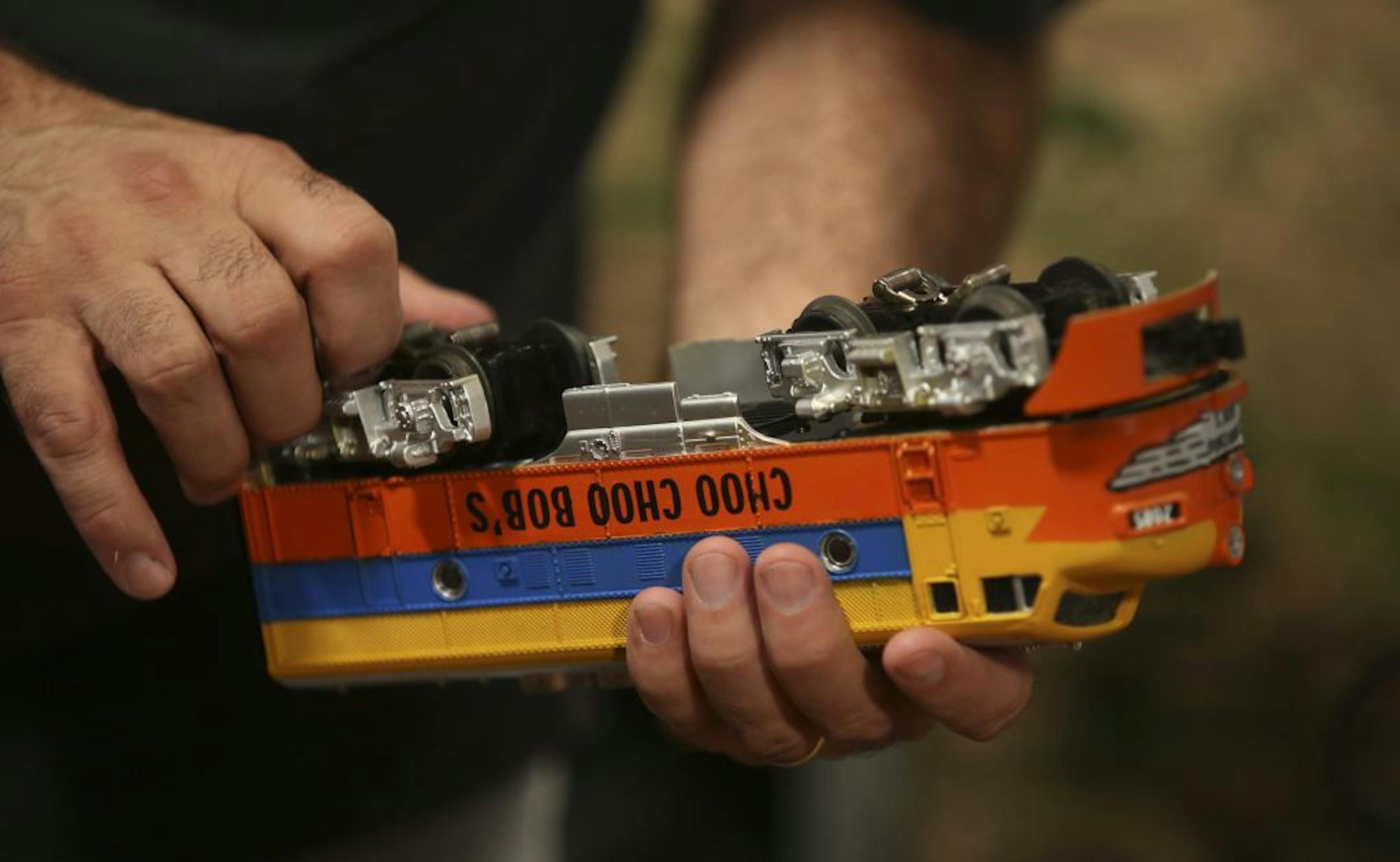Bob Medcraft, the real Choo Choo Bob, looked at engine before putting it back on the track for a shoot during the filming of an episode of The Choo Choo Bob Show in St Paul Min., Wednesday August 15, 2012.