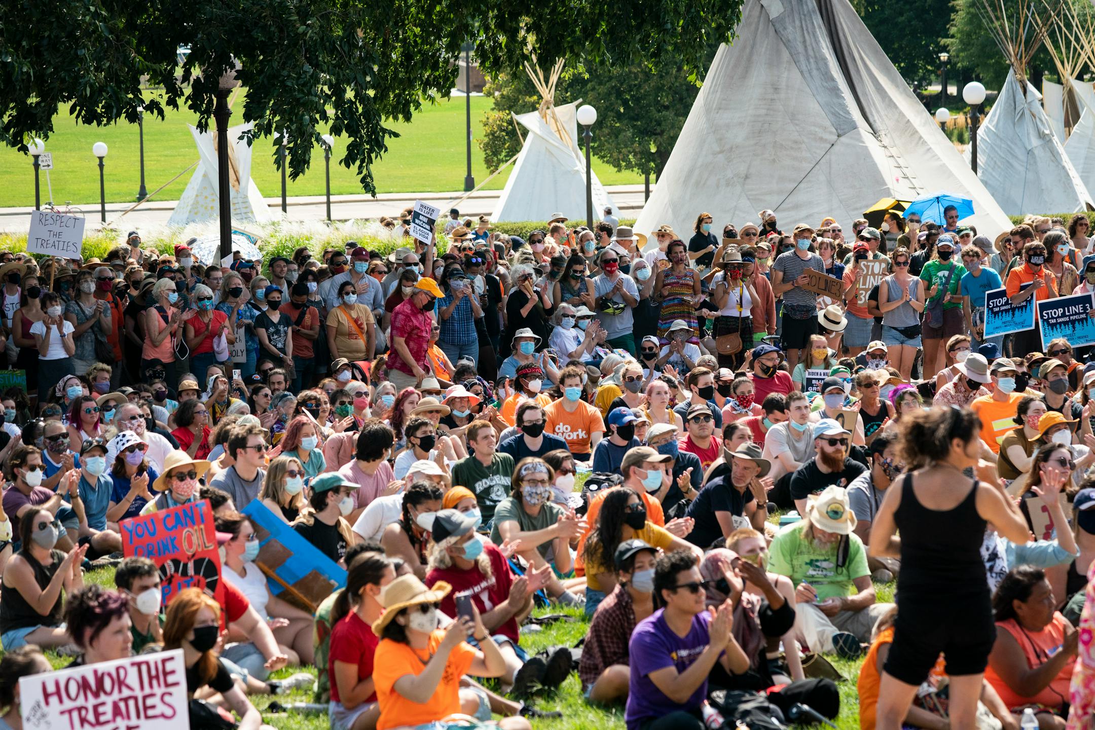 Hundreds of water protector protesters show up the the front grounds of the State Capitol for a protest against Line 3 and other pipeline projects at the State Capitol in St. Paul, Minn.