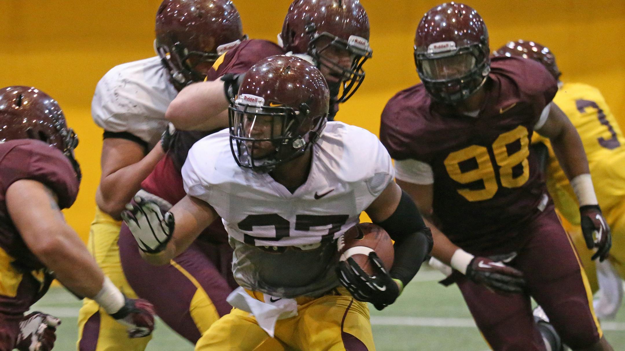 (center) Gophers Running Back David Cobb ran drills during practice on 4/9/13.] Bruce Bisping/Star Tribune bbisping@startribune.com David Cobb/roster.