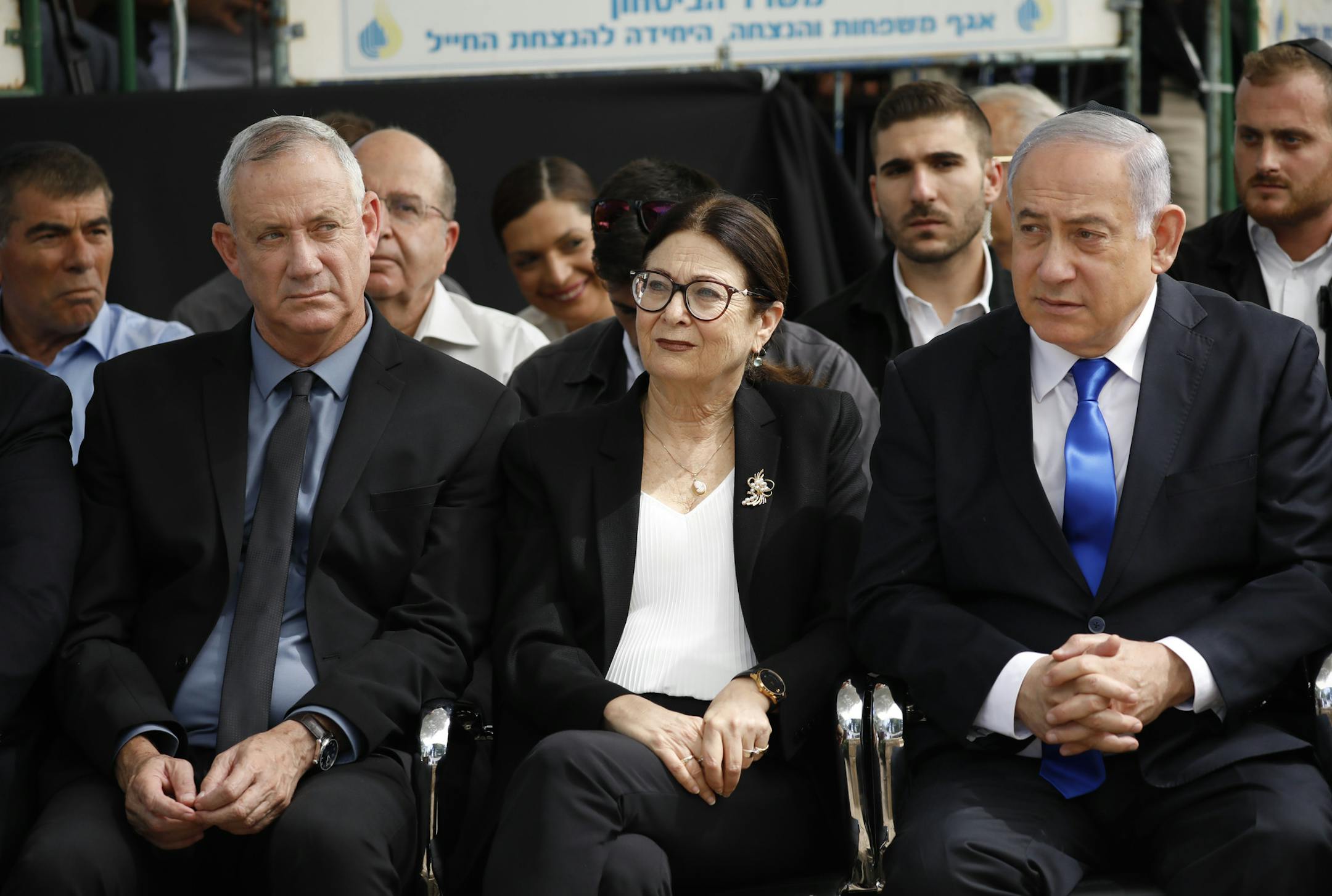 Blue and White party leader Benny Gantz, left, Esther Hayut, the Chief Justice of the Supreme Court of Israel, and Prime Minister Benjamin Netanyahu attend a memorial service for former President Shimon Peres in Jerusalem, Thursday, Sept. 19, 2019. Israelis are contending with the prospect of a third election, two days after an unprecedented repeat election left the country's two main political parties deadlocked, with neither Prime Minister Benjamin Netanyahu nor his rivals holding a clear path