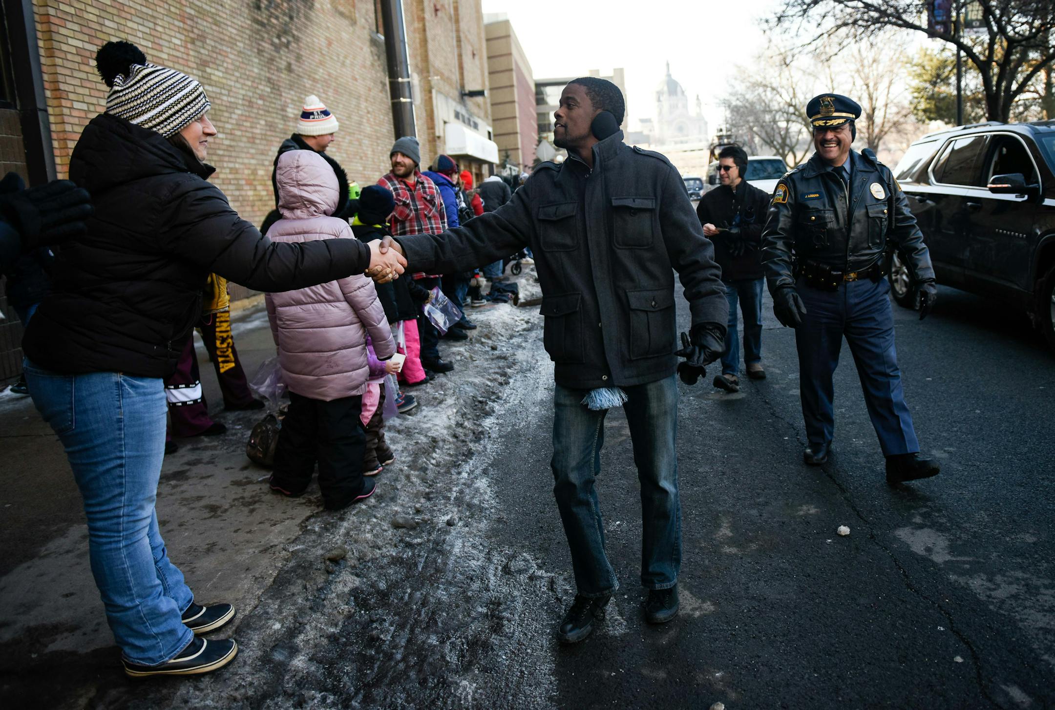 St. Paul Mayor Melvin Carter shook hands with Pauline Johnson, of Roseville, during the Winter Carnival's King Boreas Grand Day Parade Saturday. ] AARON LAVINSKY ï aaron.lavinsky@startribune.com The Winter Carnival's King Boreas Grand Day Parade was held Saturday, Jan. 27, 2018 in St. Paul, Minn.