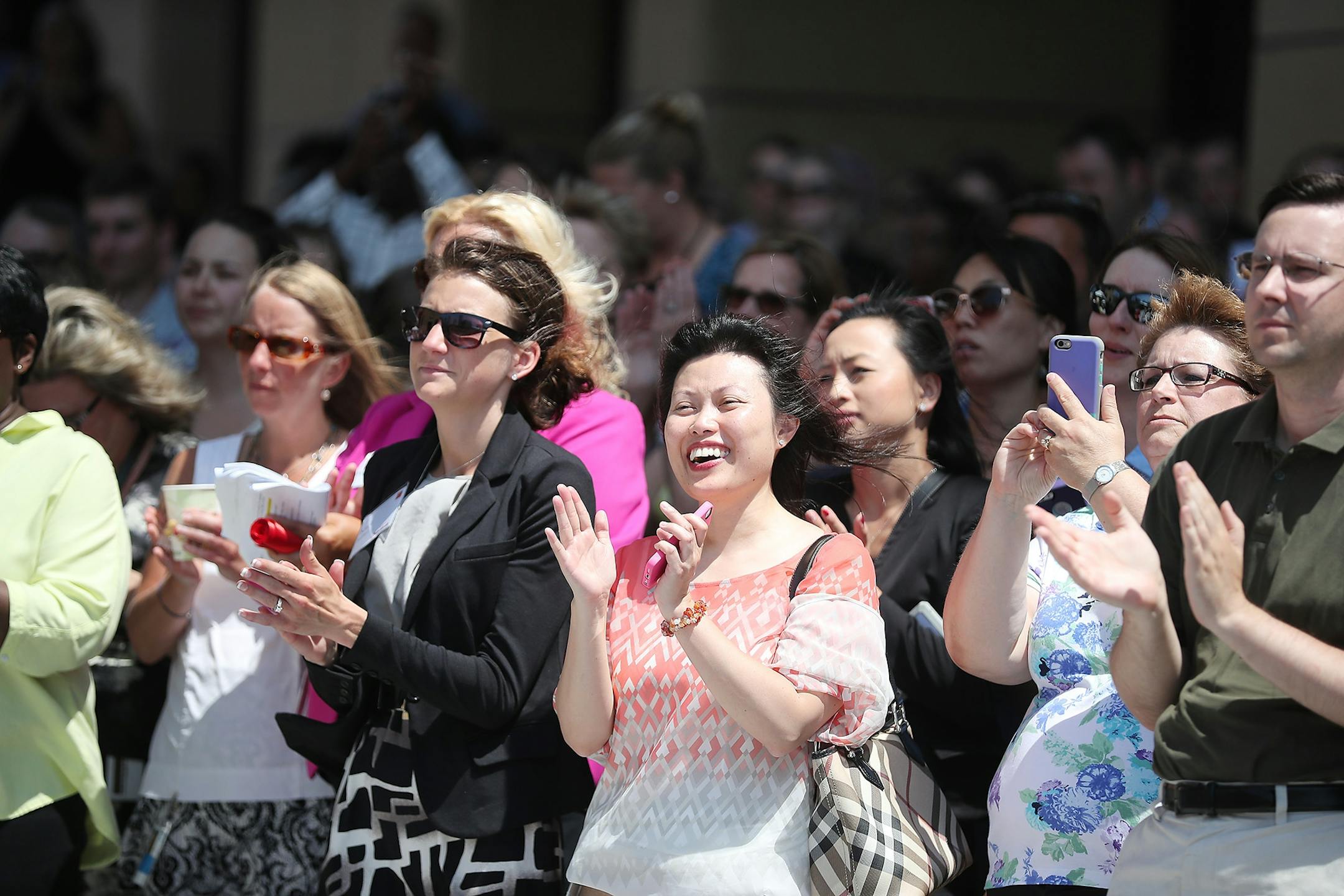 Wells Fargo employees and visitors watched as executives and city officials celebrated the grand opening of Minneapolis East Town Towers, Wednesday, July 20, 2016 in downtown Minneapolis, MN.