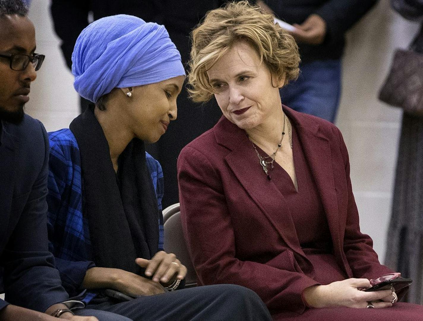 Representative Ilhan Omar and Minneapolis Mayor Betsy Hodges listened to speakers talk about the terror attack in Somalia at the Brian Coyle Center.