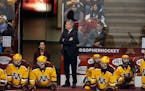 Gophers head coach Don Lucia keeps an eye on the action during a game earlier this season.