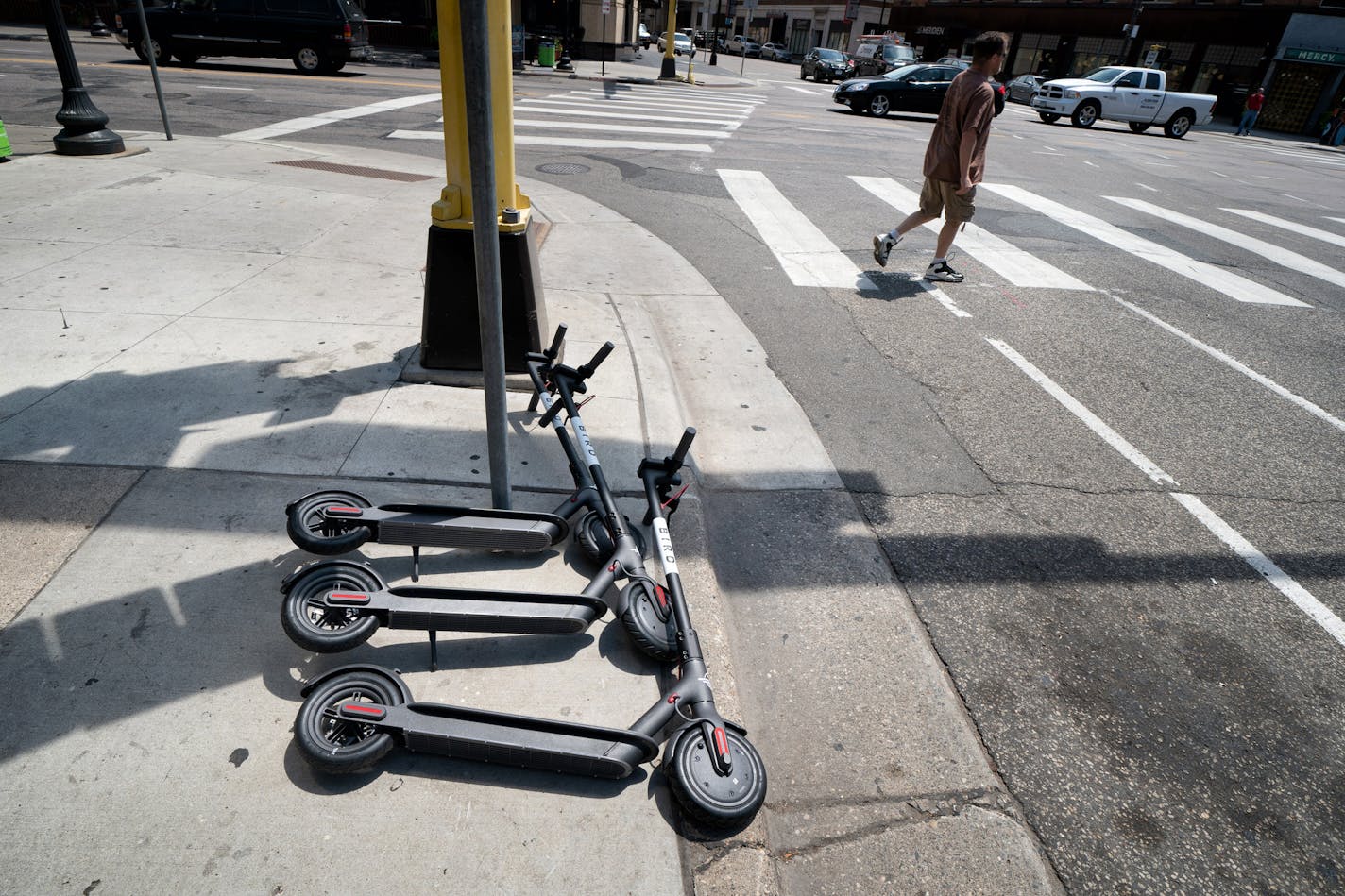 Three Bird scooters at 9th and Hennepin in downtown Minneapolis.