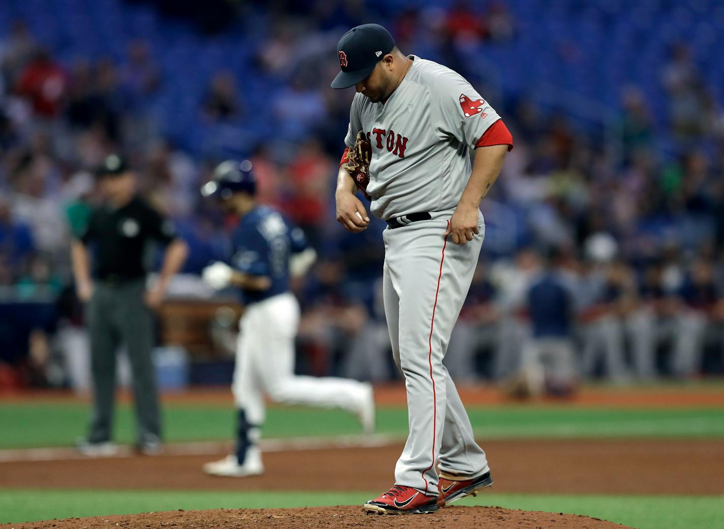 Boston Red Sox starting pitcher Jhoulys Chacin reacts after giving up a solo home run to Tampa Bay Rays Brandon Lowe during the fourth inning of a baseball game Monday, Sept. 23, 2019, in St. Petersburg, Fla. (AP Photo/Chris O'Meara)