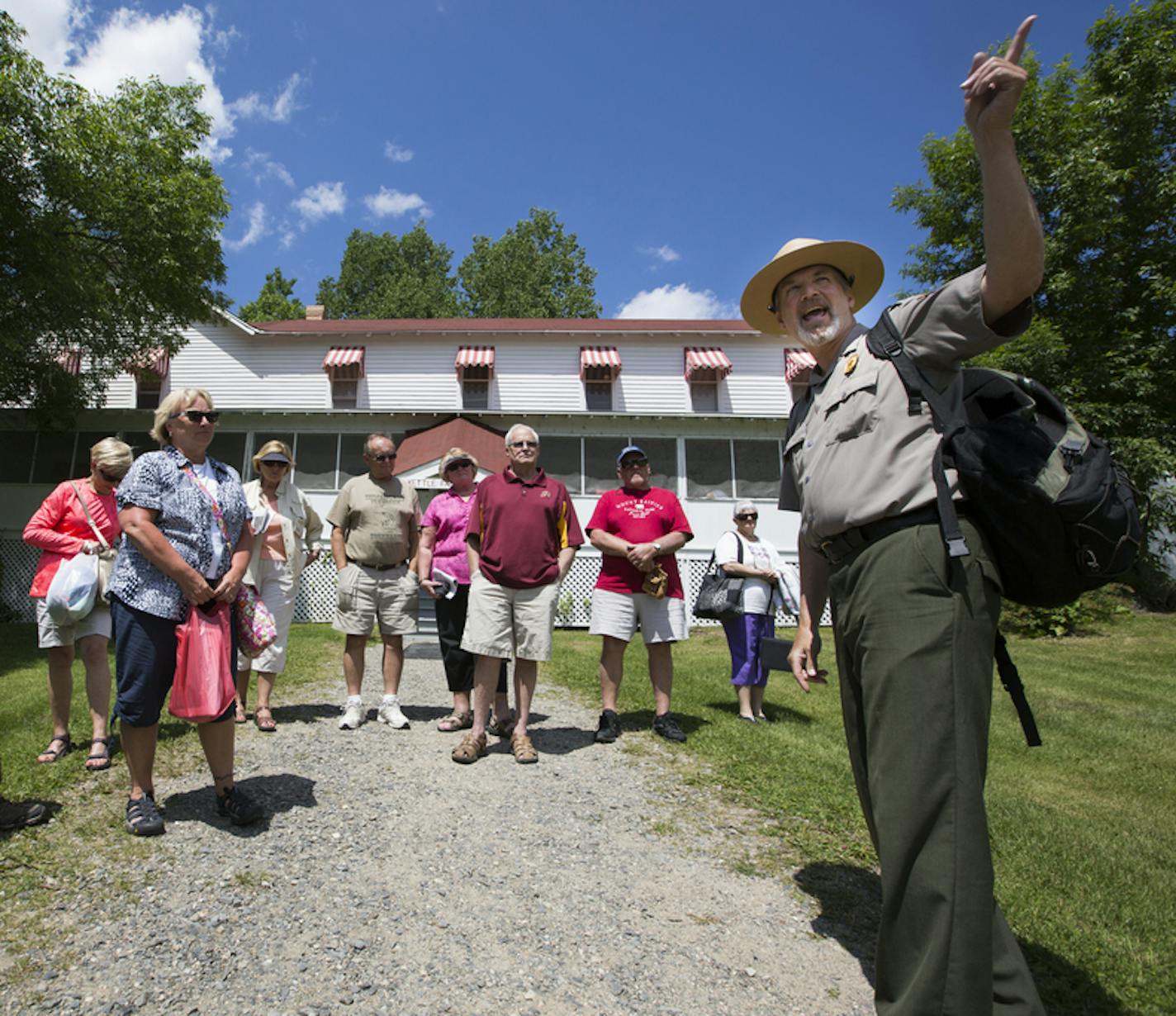 Kevin Nelson, right, an interpretive park ranger, leads a tour group at the Kettle Falls Hotel. ] (Leila Navidi/Star Tribune) leila.navidi@startribune.com BACKGROUND INFORMATION: Voyageurs National Park in Minnesota on Friday, June 24, 2016.