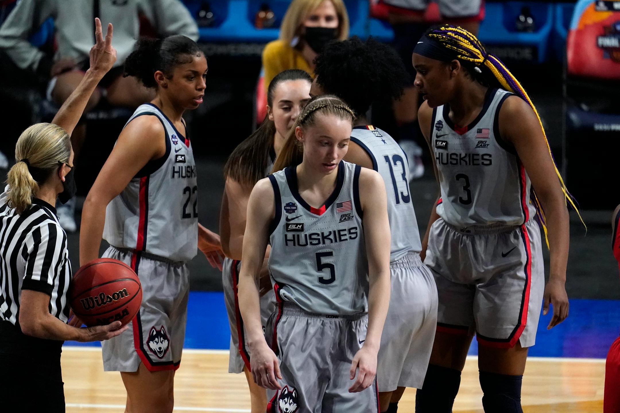 Connecticut guard Paige Bueckers reacts after getting fouled during the second half of a women's Final Four semifinal game against Arizona