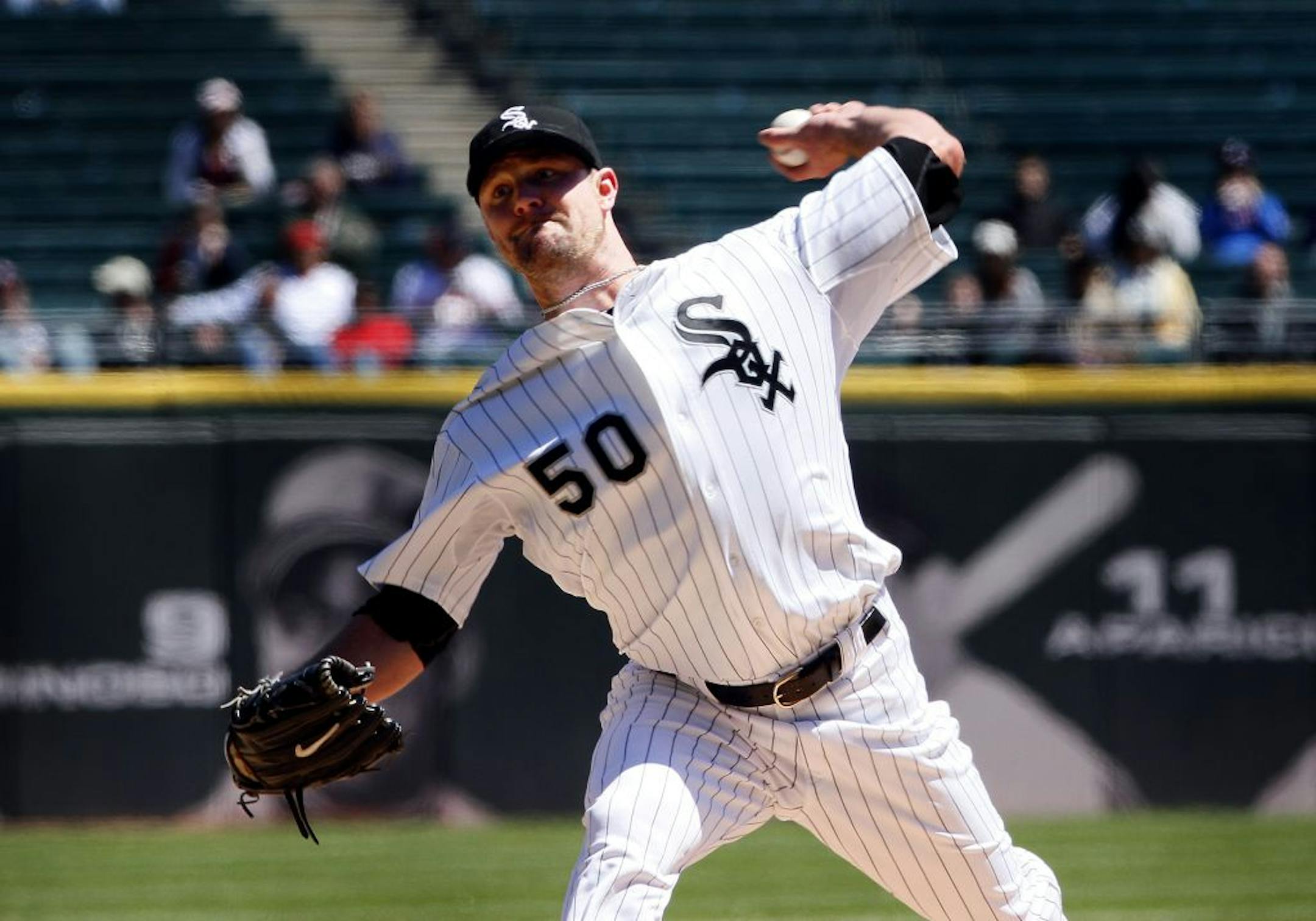 Chicago White Sox starting pitcher John Danks pitches to the Minnesota Twins in the first inning of their game in Chicago on Wed. May 4, 2011.