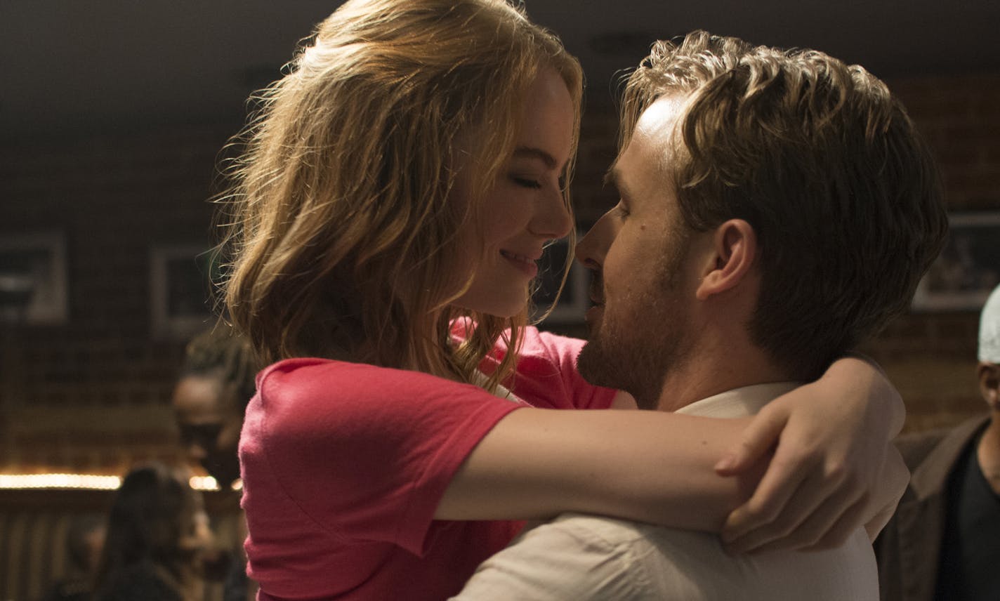 This image released by Lionsgate shows Ryan Gosling, right, and Emma Stone in a scene from, "La La Land." The film was nominated for a Golden Globe award for best motion picture musical or comedy on Monday, Dec. 12, 2016. The 74th Golden Globe Awards ceremony will be broadcast on Jan. 8, on NBC. (Dale Robinette/Lionsgate via AP)