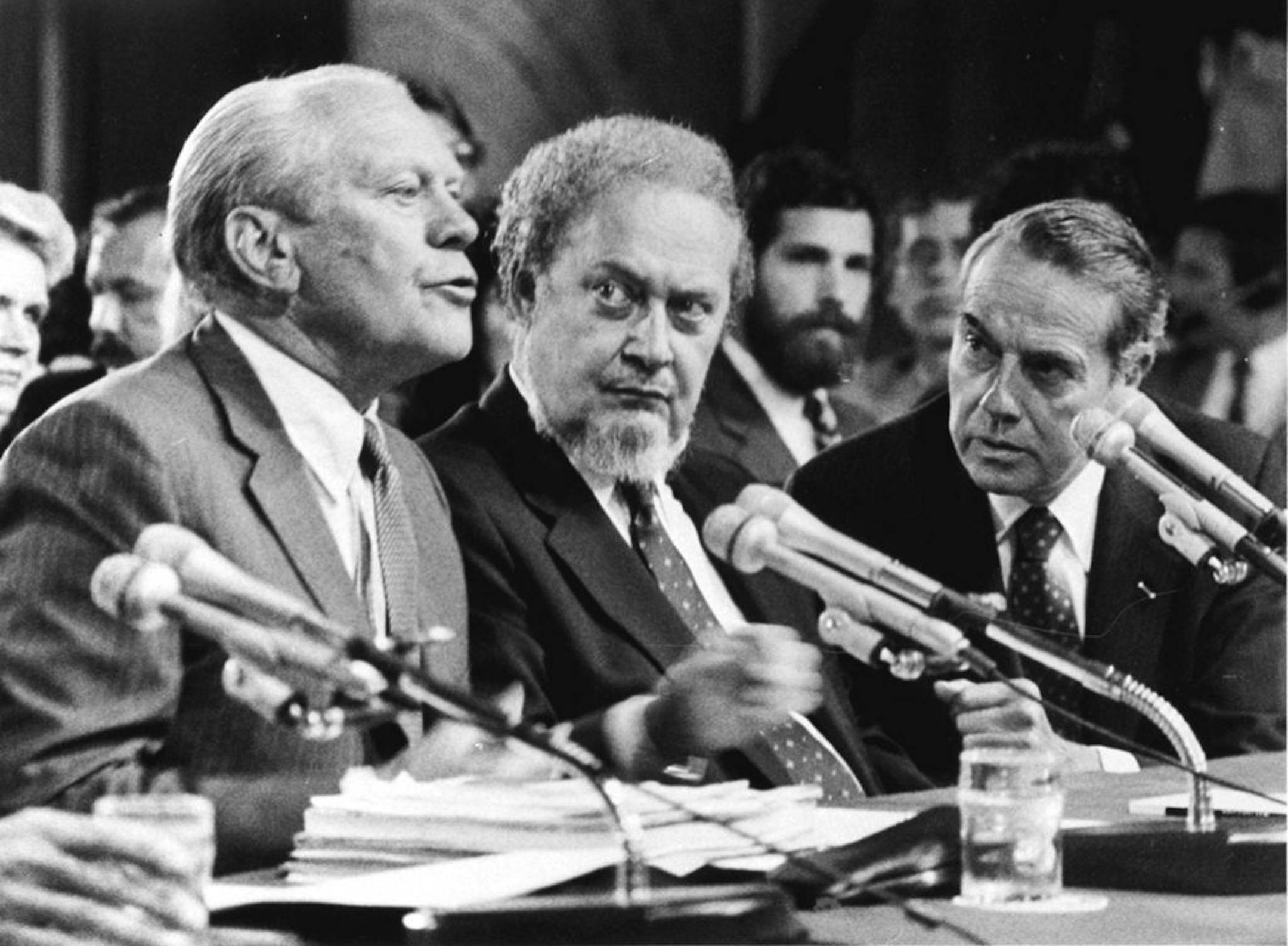 FILE - In this Sept. 15, 1987 file photo, former President Gerald Ford, left, introduces Supreme Court Associate Justice nominee Robert Bork, as the Senate Judiciary Committee began confirmation hearings on the nomination on Capitol Hill. Ford praised Bork as being "uniquely qualified" for the post. At right is Sen. Robert Dole, R-KS, who also made a statement on Bork. Robert Bork, whose failed Supreme Court nomination made history, has died.