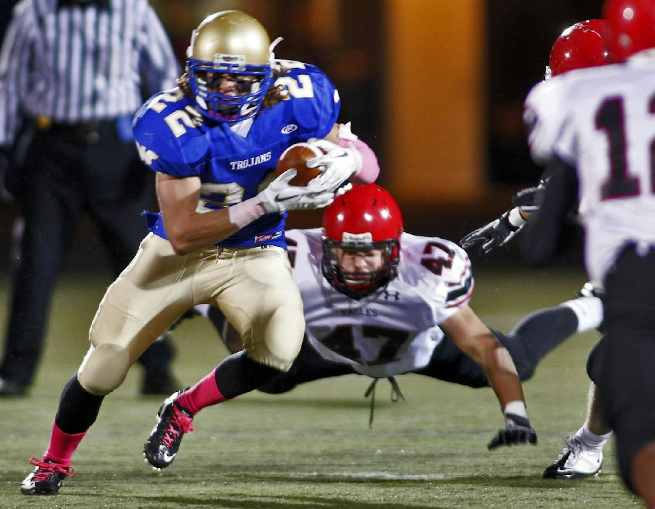 Wayzata's Erik Roti (22), shown here against Eden Prairie, was among those who helped the Trojans advance to Friday's section final against Osseo.