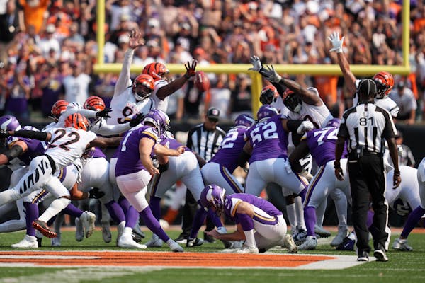 Minnesota Vikings kicker Greg Joseph (1) kicked a tying field goal to send the game into overtime at the end of the fourth quarter.