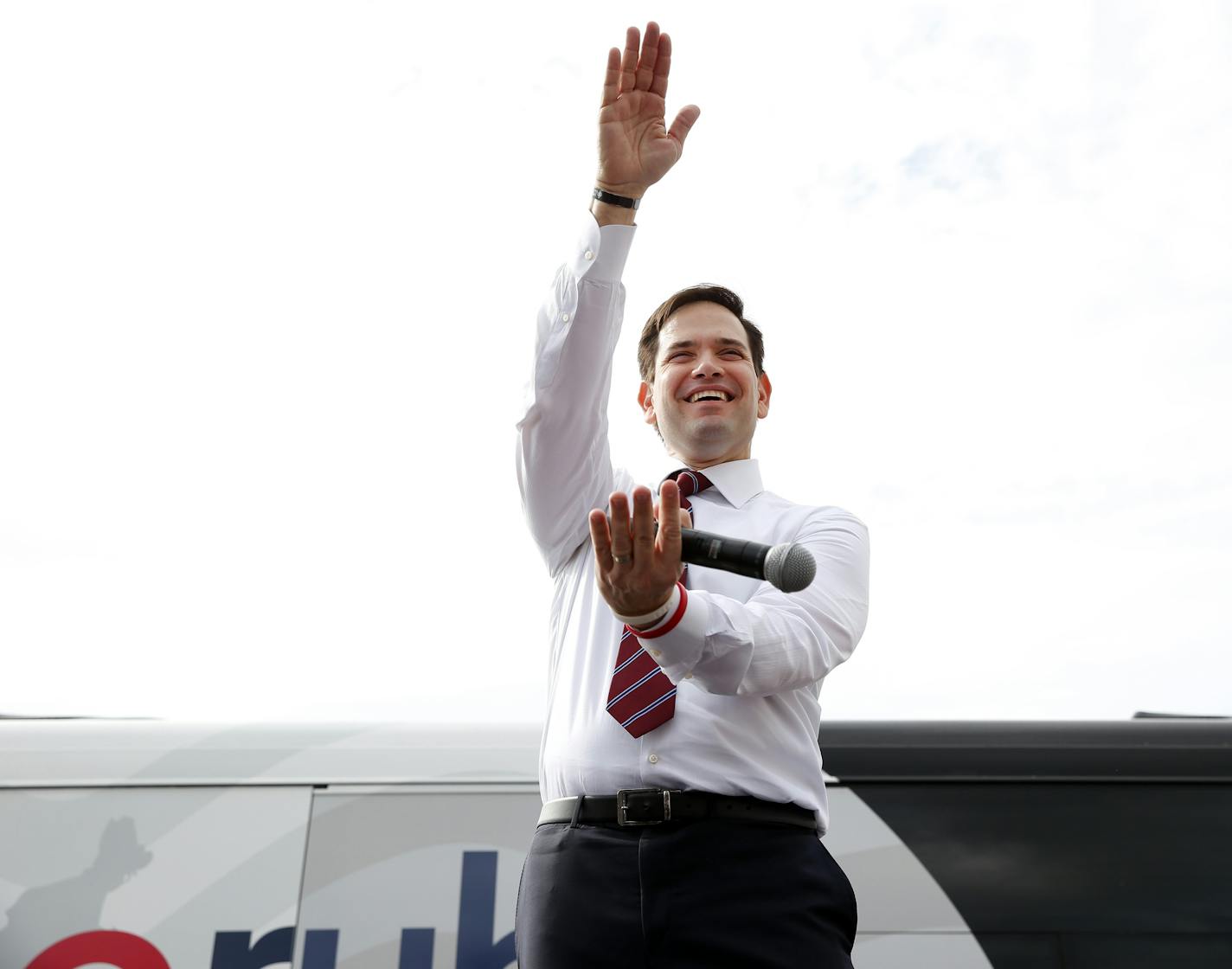 Republican presidential candidate, Sen. Marco Rubio, R-Fla., tries to combine cheers for the University of Florida and Florida State University at a campaign rally in Largo, Fla., Saturday, March 12, 2016. (AP Photo/Paul Sancya)