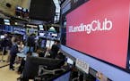 The Lending Club logo appears above the post where it trades on the floor of the New York Stock Exchange, Wednesday, May 18, 2016. (AP Photo/Richard D