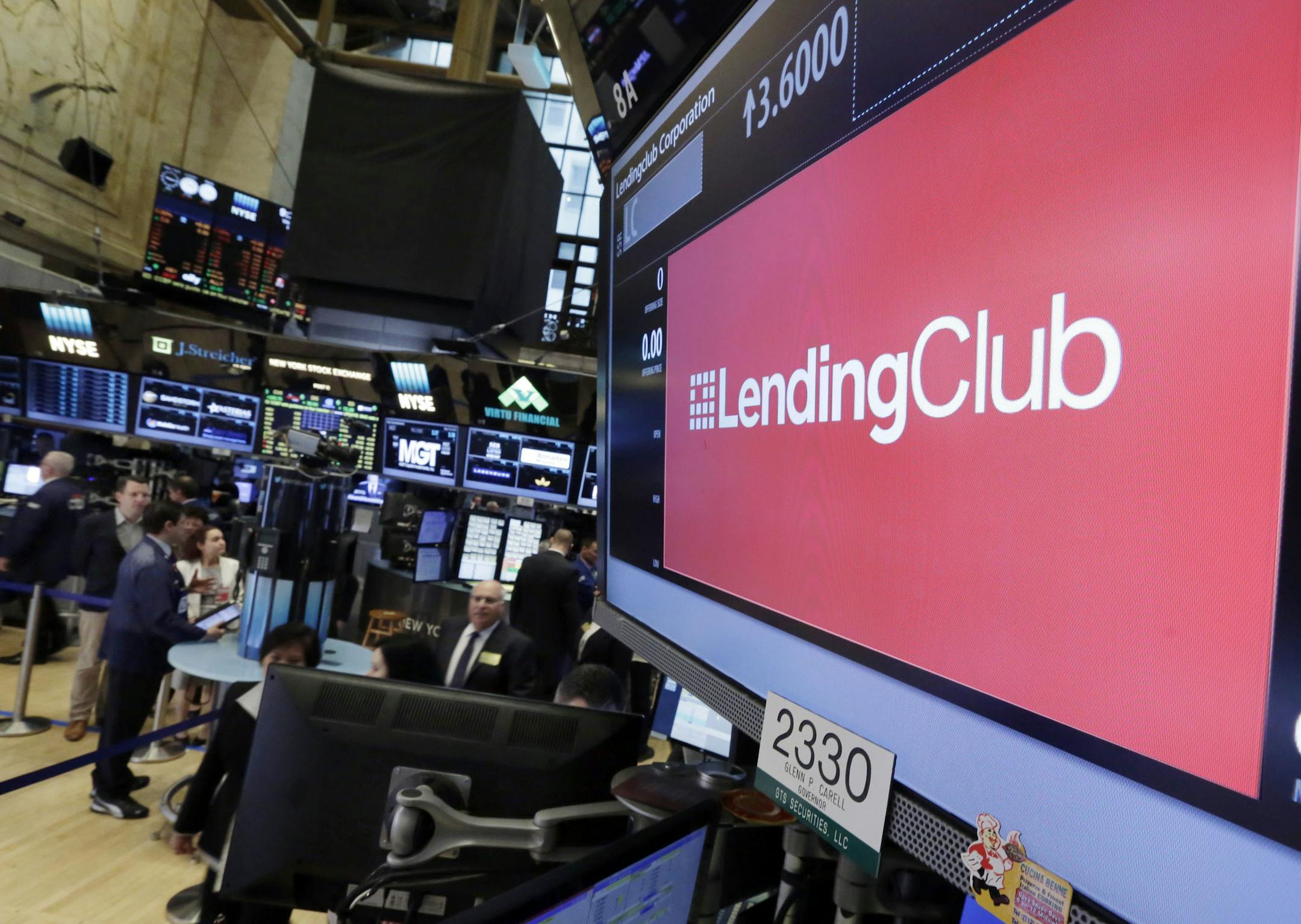 The Lending Club logo appears above the post where it trades on the floor of the New York Stock Exchange, Wednesday, May 18, 2016. (AP Photo/Richard Drew) ORG XMIT: NYRD104