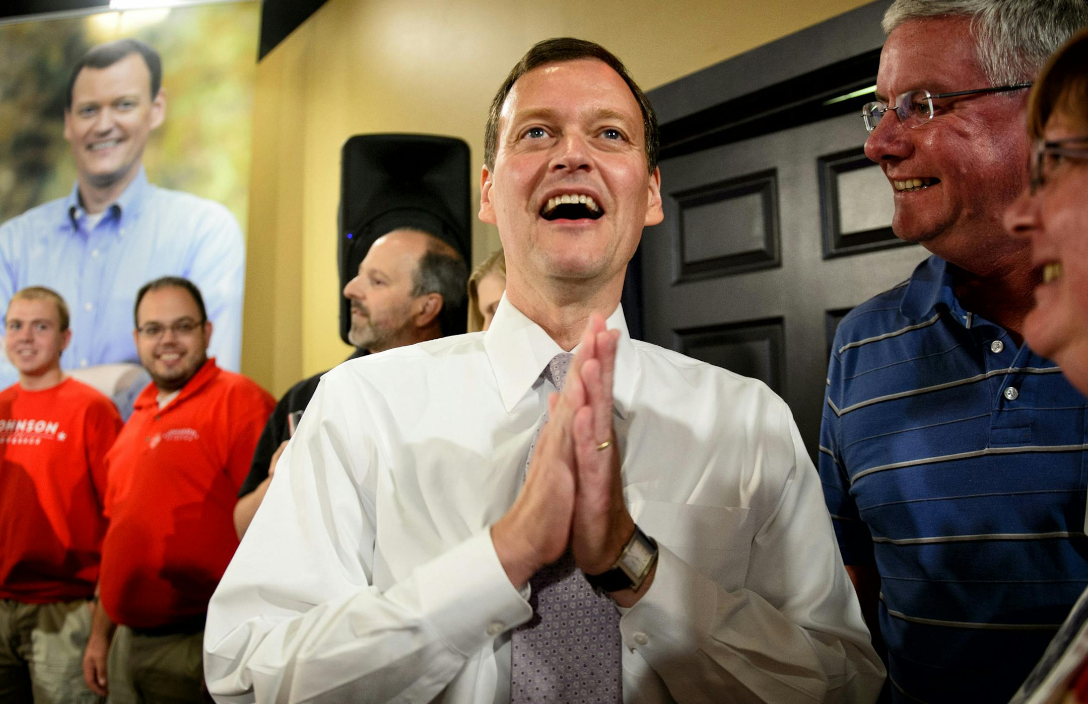Jeff Johnson was delighted as he looked at election results on a television screen showing him ahead in the race. He was greeted by supporters as he entered his victory party at Digby's restaurant in Plymouth Tuesday night. ] Tuesday, August 12, 2014. GLEN STUBBE * gstubbe@startribune.com