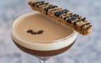 The Black Cat espresso martini at the Grocer’s Table in Wayzata comes with a housemade biscotti.
