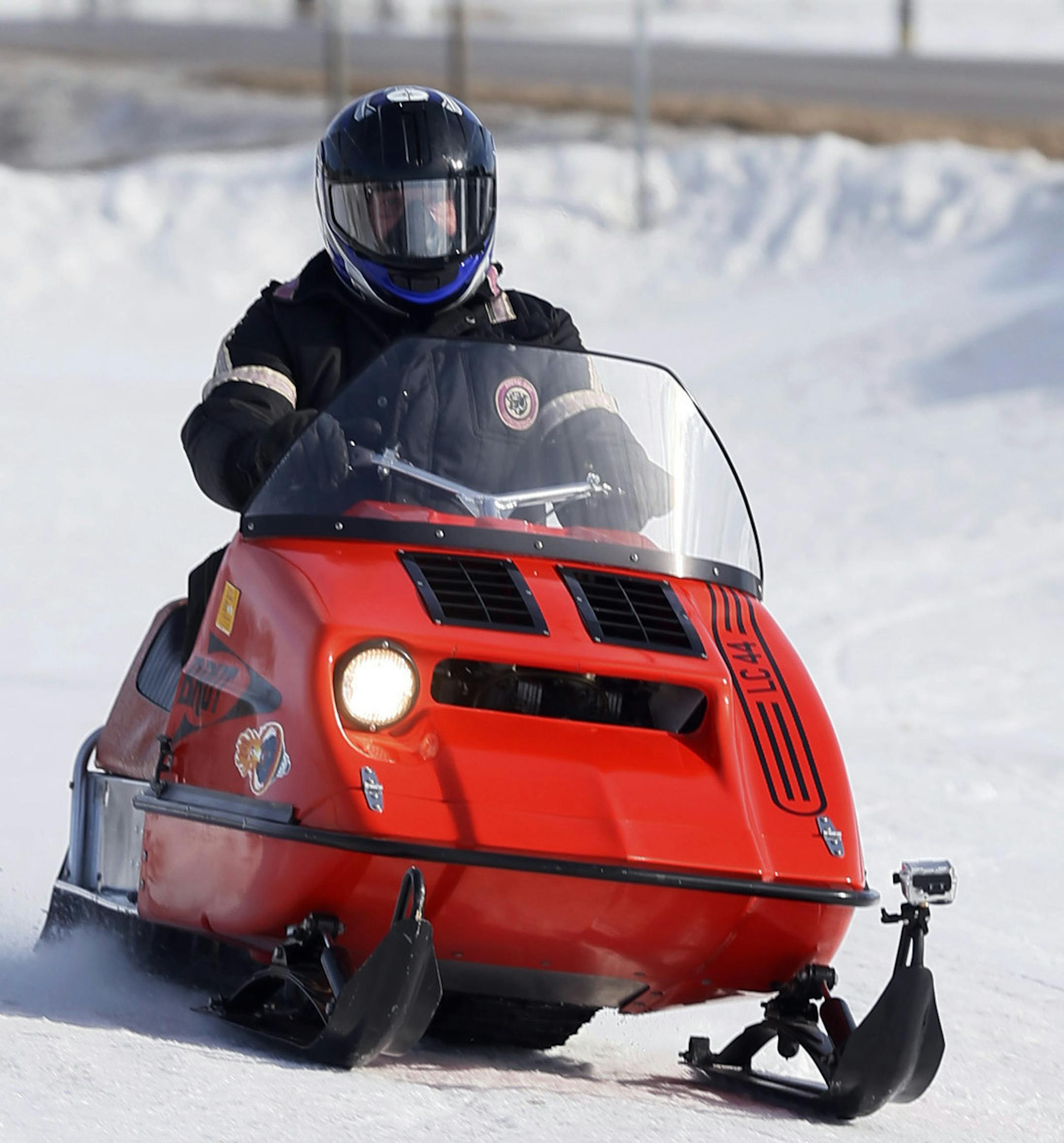 Ron Ebbers left went for a short ride on his vintage Brut snowmobile as he friend Jack Speckel looked on. the two men are preparing for this weekend Midwest Vintage Snowmobile show which will be in held in Waconia on January 26-27 .] JERRY HOLT ‚Ä¢ jerry.holt@startribune.com ORG XMIT: MIN1301211220091035