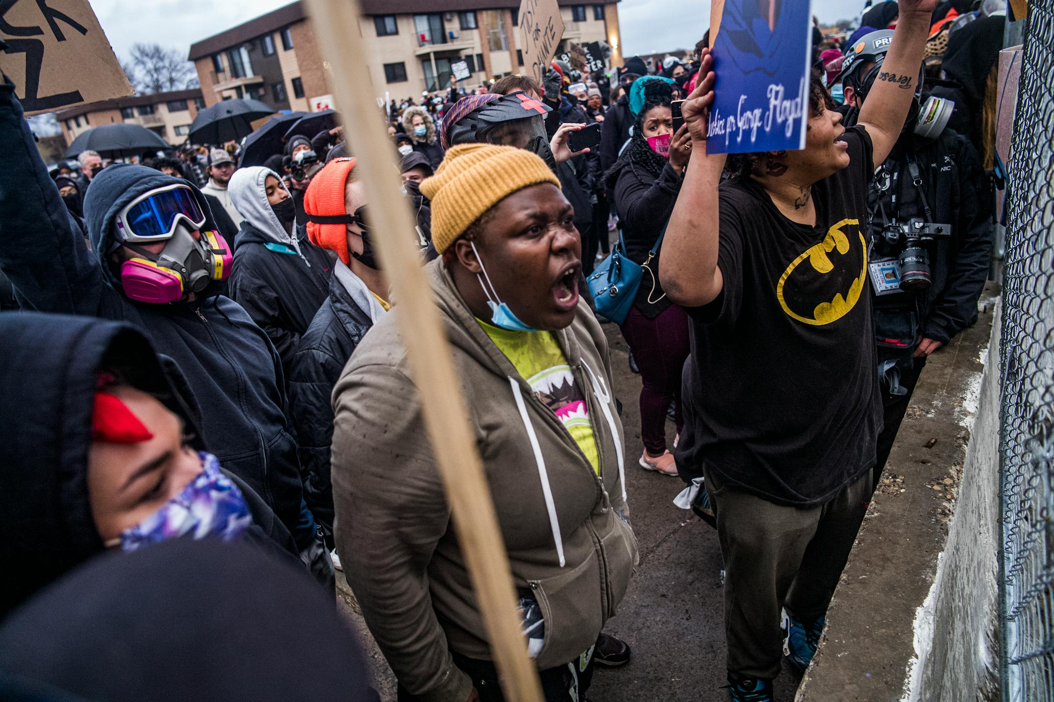 People protest near the Brooklyn Center Police Department in response to the fatal police shooting of Daunte Wright, Wednesday, April 14, 2021 in Brooklyn Center, Minn. Former Brooklyn Center police officer Kimberly Potter was charged with second degree manslaughter after the shooting.