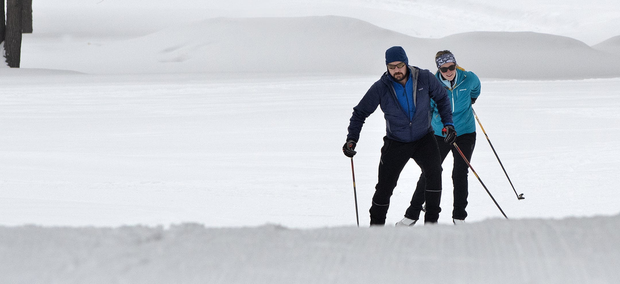 Last Saturday, cross-country skiers Tyler and Kate Hurd, of Brainerd, skate-ski an open section of trail at the Northland Arboretum in Brainerd.