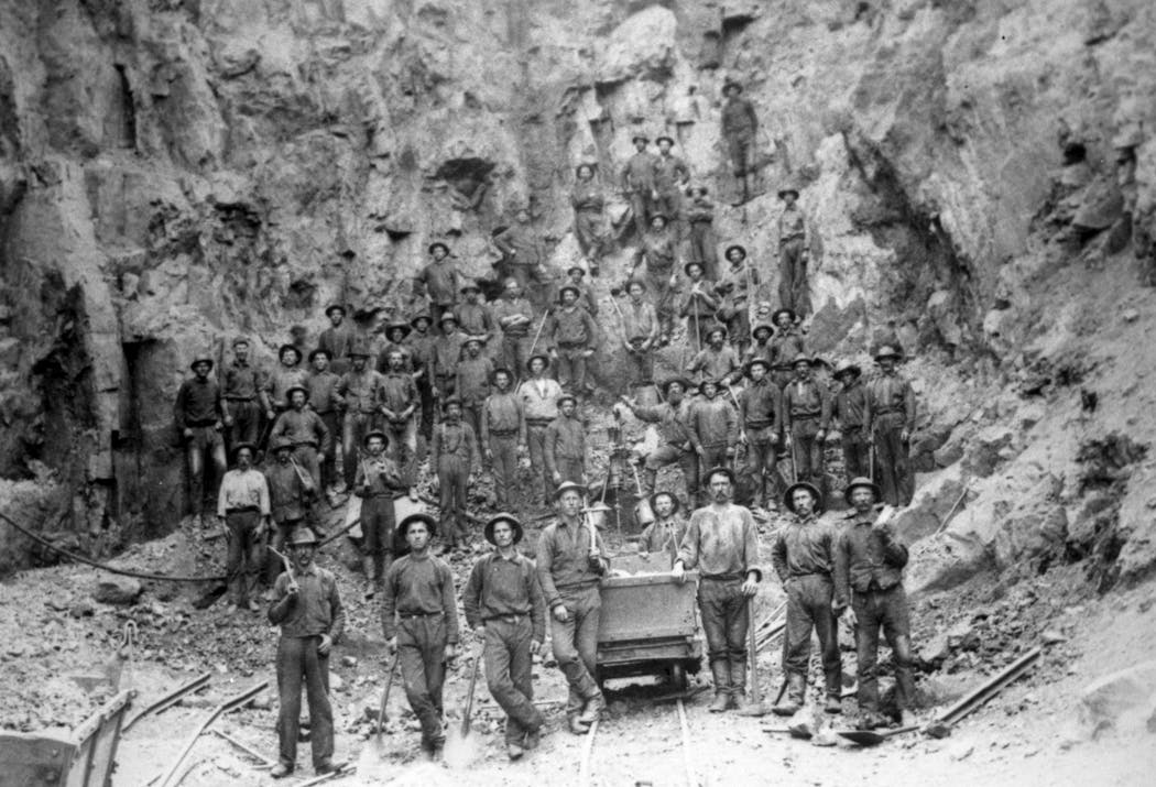 Workers in an open pit mine on the Iron Range in 1907. The precise location is not known.