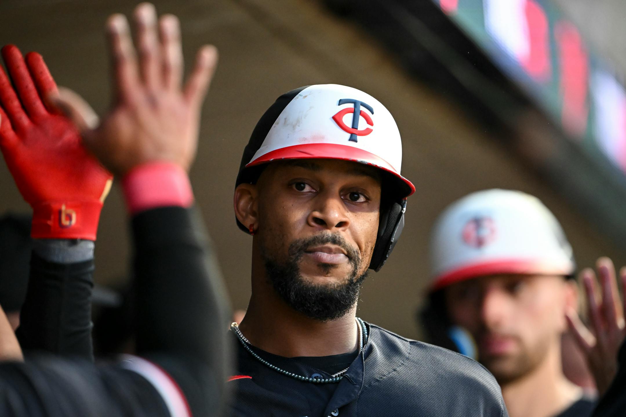 Minnesota Twins designated hitter Byron Buxton (25) celebrates with teammates after hitting a 2-run home run in the bottom of the 8th inning Tuesday, June 20, 2023, at Target Field in Minneapolis, Minn.