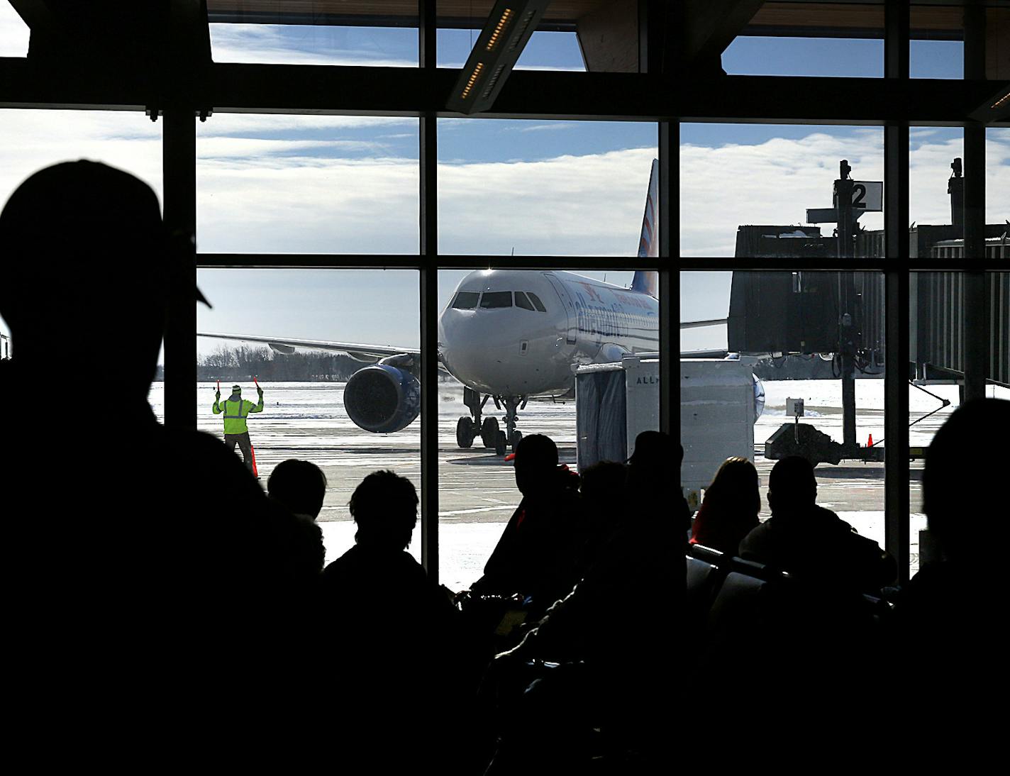 Passengers watch the arrival of a flight from Phoenix in the terminal at the St. Cloud Regional Airport in anticipation of boarding the aircraft for the return flight to Arizona. ] JIM GEHRZ &#x201a;&#xc4;&#xa2; jgehrz@startribune.com / St. Cloud, MN / February 26, 20134/ 11:00 AM - BACKGROUND INFORMATION: Five years after Delta pulled its service from Minnesota's smaller airports amid a dismal time for airlines, there are signs of resurgence. St. Cloud will start daily service to Chicago soon.