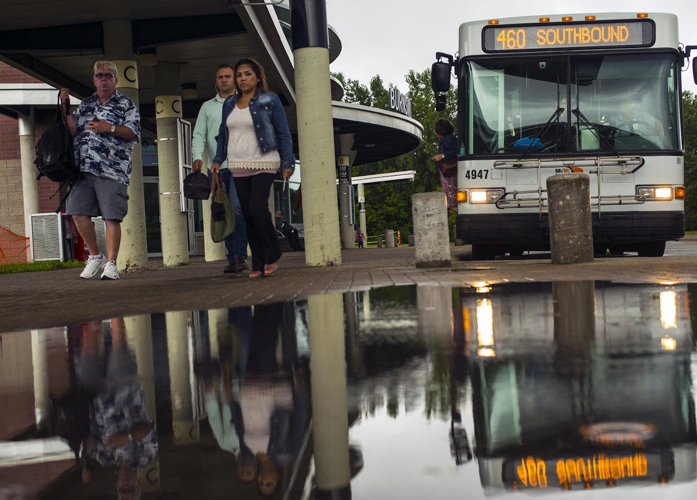 At the Burnsville Transit Station, commuters got off the bust during rush hour.] Richard Tsong-Taatarii/rtsong-taatarii@startribune.com