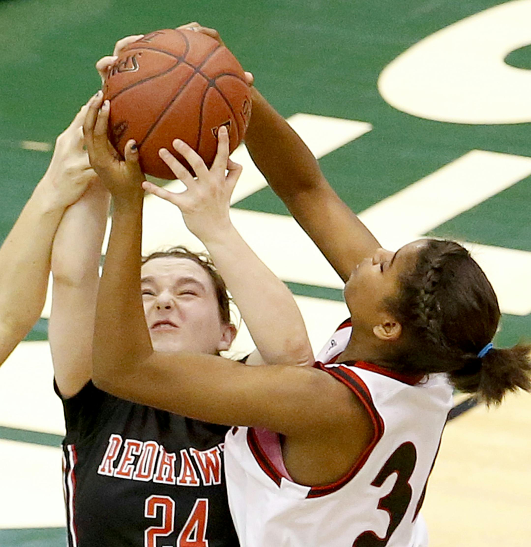 Sarah Kaminski (24) of Minnehaha Academy and Kamryn D'Heilly (34) of Annandale fought for a rebound in the second half. ] CARLOS GONZALEZ cgonzalez@startribune.com, March 18, 2015, Minneapolis, Minn., 2015, Mariucci Arena, High School / Prep Girls Basketball, Class 2A quarterfinals, Annandale vs. Minnehaha Academy