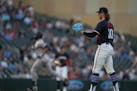 Twins pitcher Chris Paddack waits for a new baseball after he gave up a third-inning solo home run to Yankees designated hitter Giancarlo Stanton on T