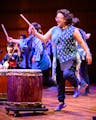 Jennifer Weir plays the drum during a recent Taiko performance at the Ordway.