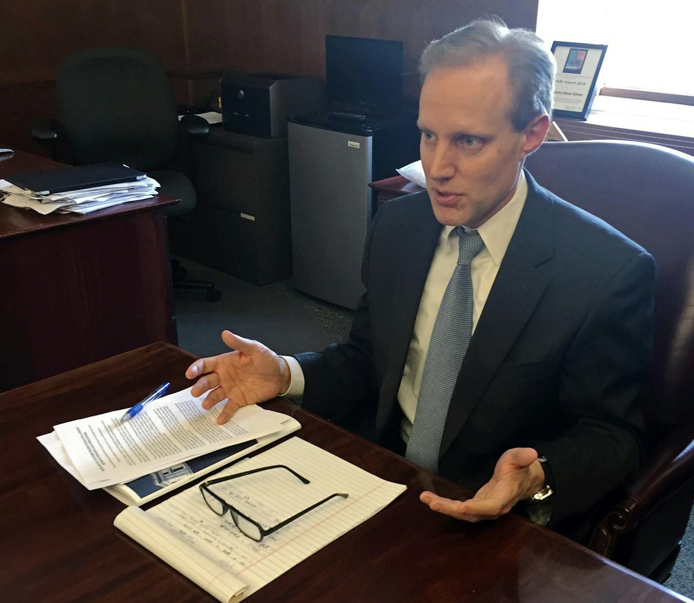 FILE - In this March 16, 2018 file photo, Minnesota Secretary of State Steve Simon discusses election security issues in his St. Paul, Minn. office. (AP Photo/Steve Karnowski,File)