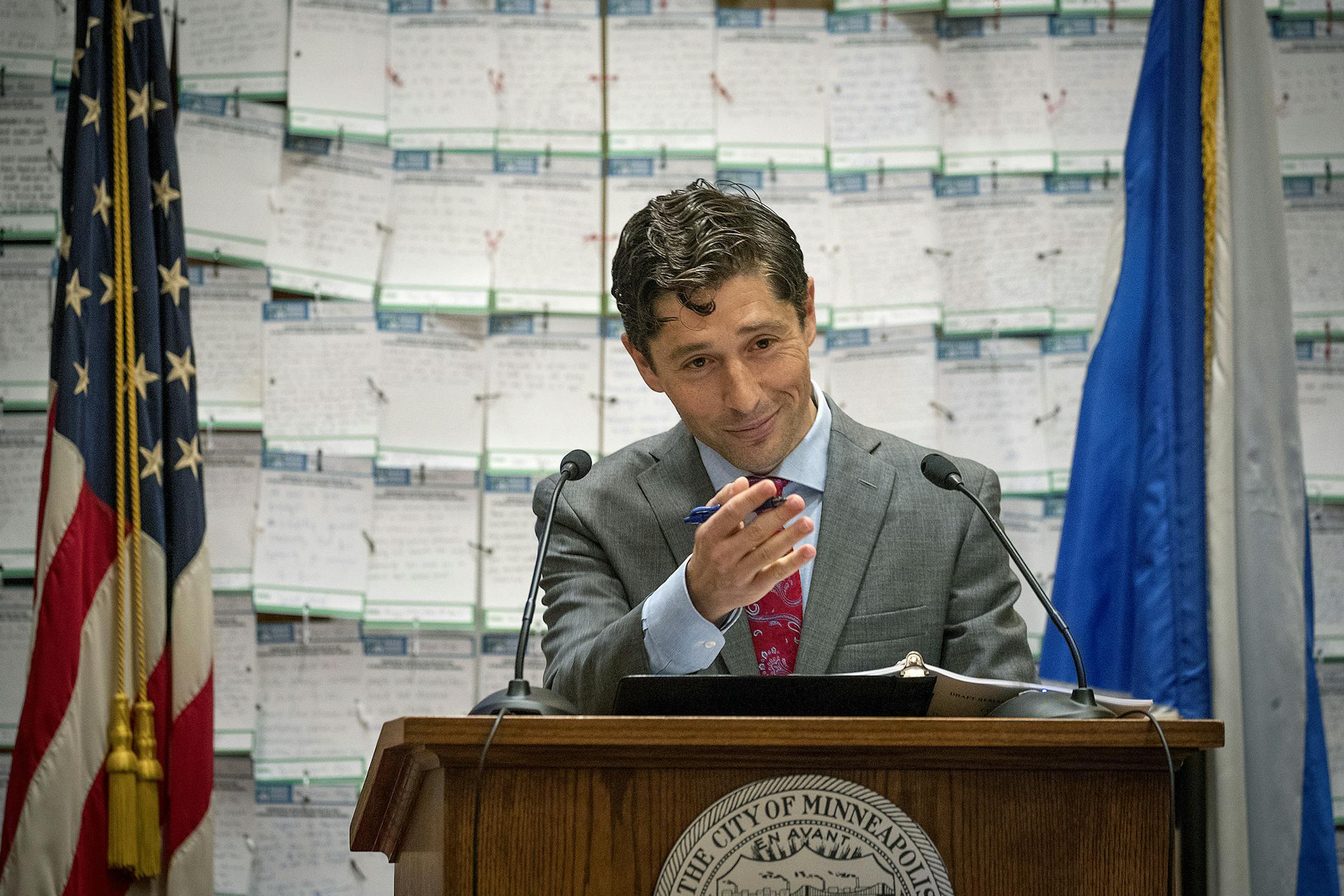 Minneapolis Mayor Jacob Frey gives his first budget address in front of notes to him from the people about the affordability of housing, at Minneapolis City Hall, Wednesday, Aug. 15, 2018, in Minneapolis. (Elizabeth Flores/Star Tribune via AP)