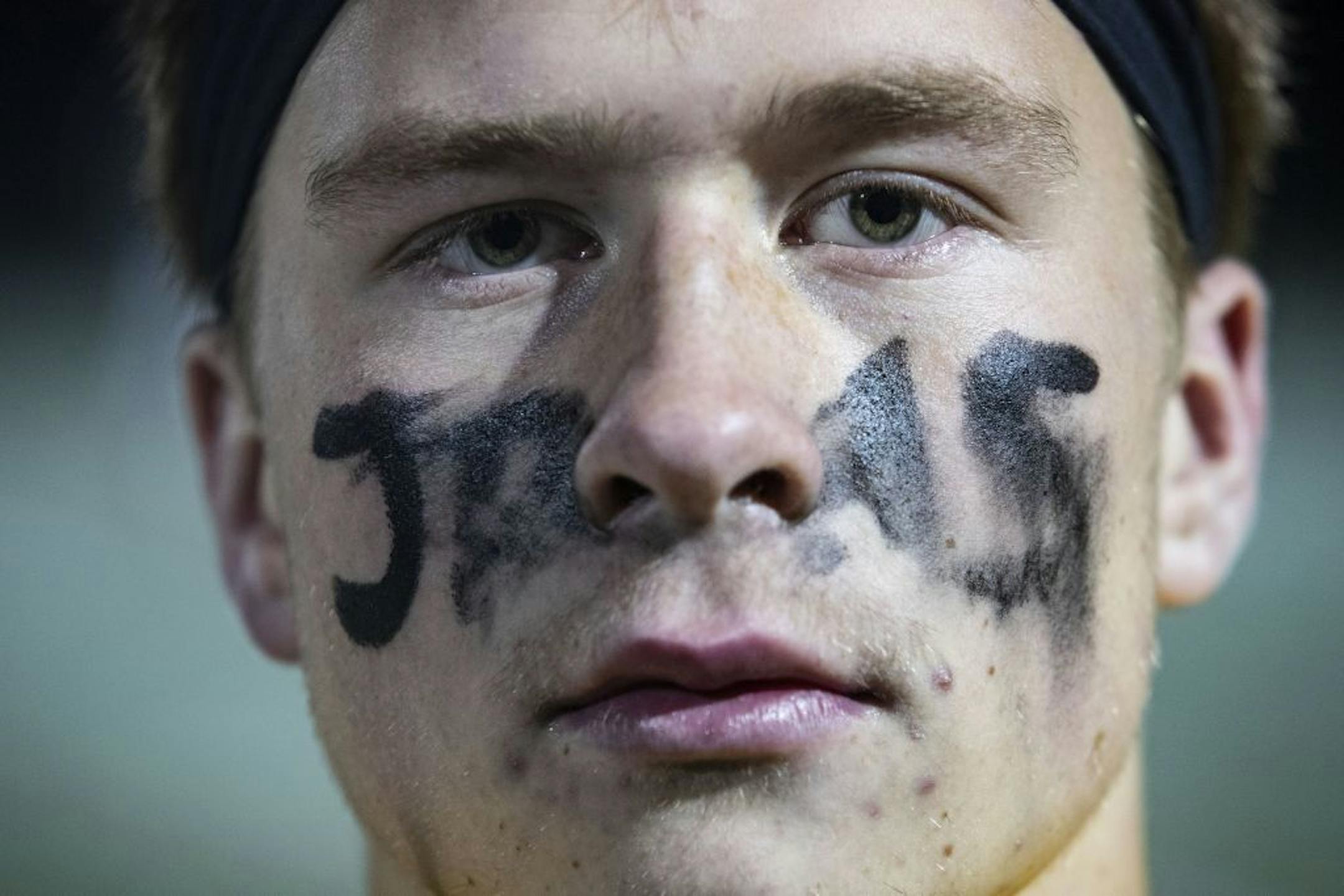 Esko football player Brock House (2) painted his face in honor of Jackson Pfister.