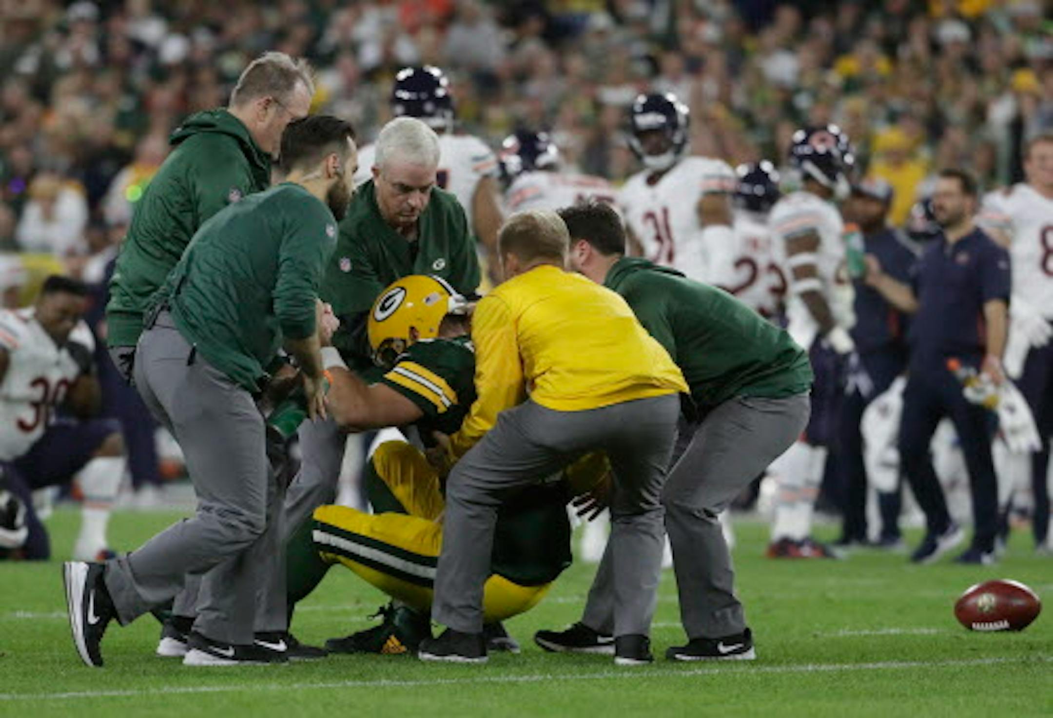 Green Bay Packers quarterback Aaron Rodgers is hurt after being sacked during the first half of an NFL football game against the Chicago Bears Sunday, Sept. 9, 2018, in Green Bay, Wis. (AP Photo/Morry Gash)