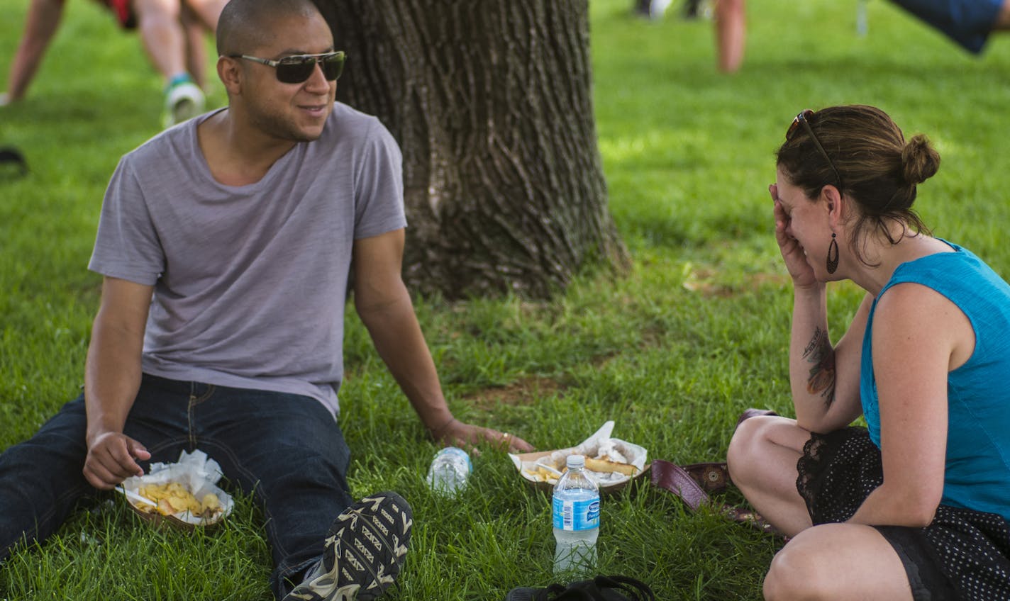 Keith Hepburn and Taryn Wichterman enjoy their lunch hour under the shade of a tree.]The Minneapolis Park and Recreation Board is voting Wednesday evening to allow Downtown East Commons to use up to $8 million of park dedication fees.Richard Tsong-Taatarii/Richard Tsong-taatarii@startribune.com