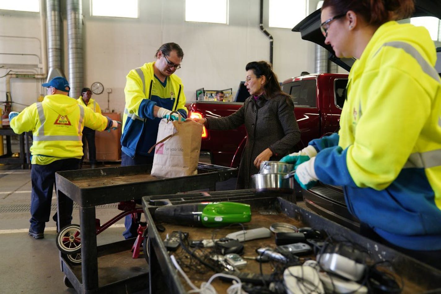 Workers at the South Hennepin Recycling and Problem Waste Drop-off Center in Bloomington sorted through items being brought in Wednesday. The public can now bring batteries for disposal to the Bloomington site or another site in Brooklyn Park.