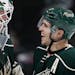 Minnesota Wild goalie Devan Dubnyk (4) and Zach Parise celebrated at the end of the game. Minnesota beat Chicago by a final score of 3-0. ] CARLOS GON