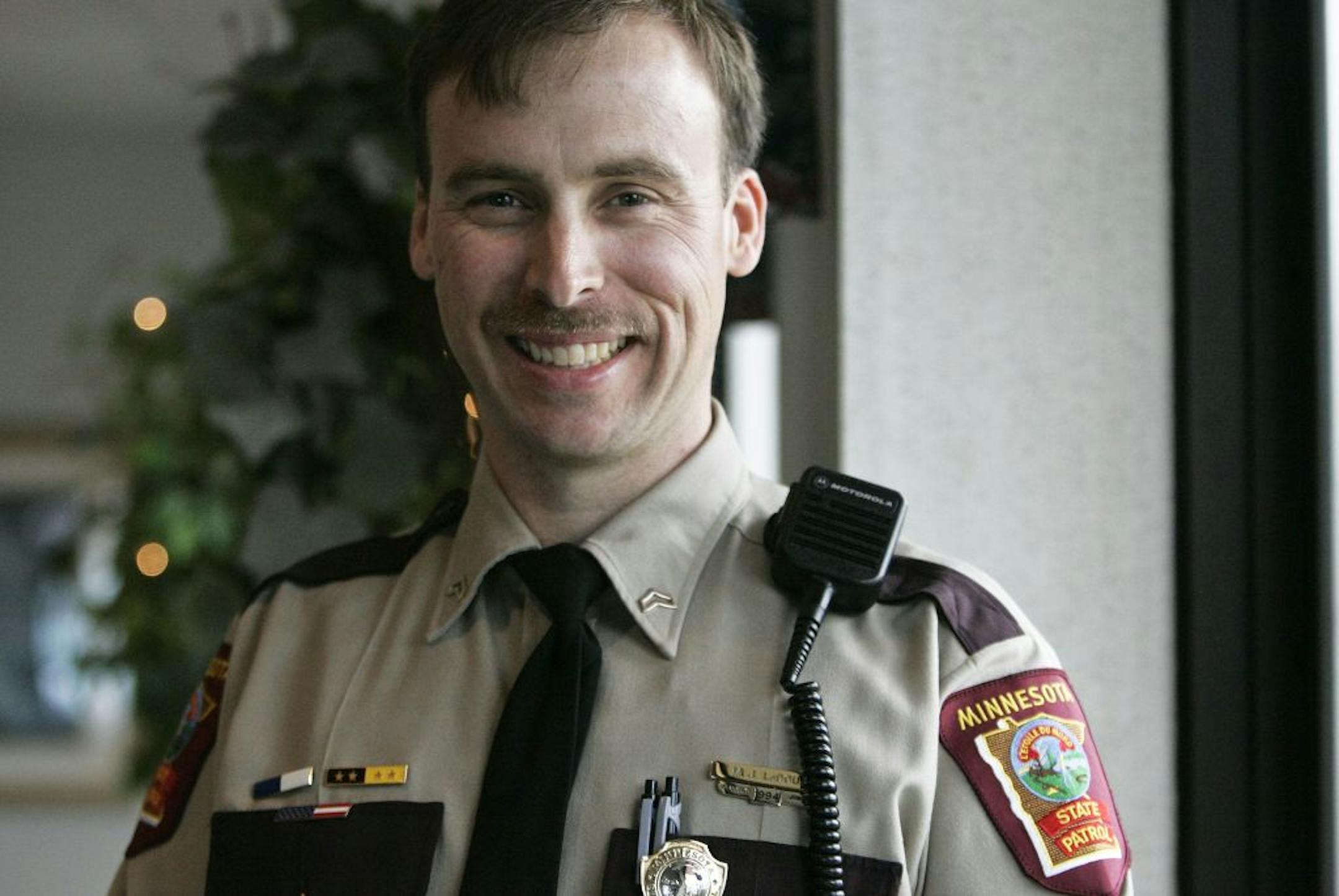 Trooper Mike LeDoux was honored Tuesday with his fifth meritorious service award for his part in a late-night rescue over the St. Louis River of a suicidal man near Duluth.
