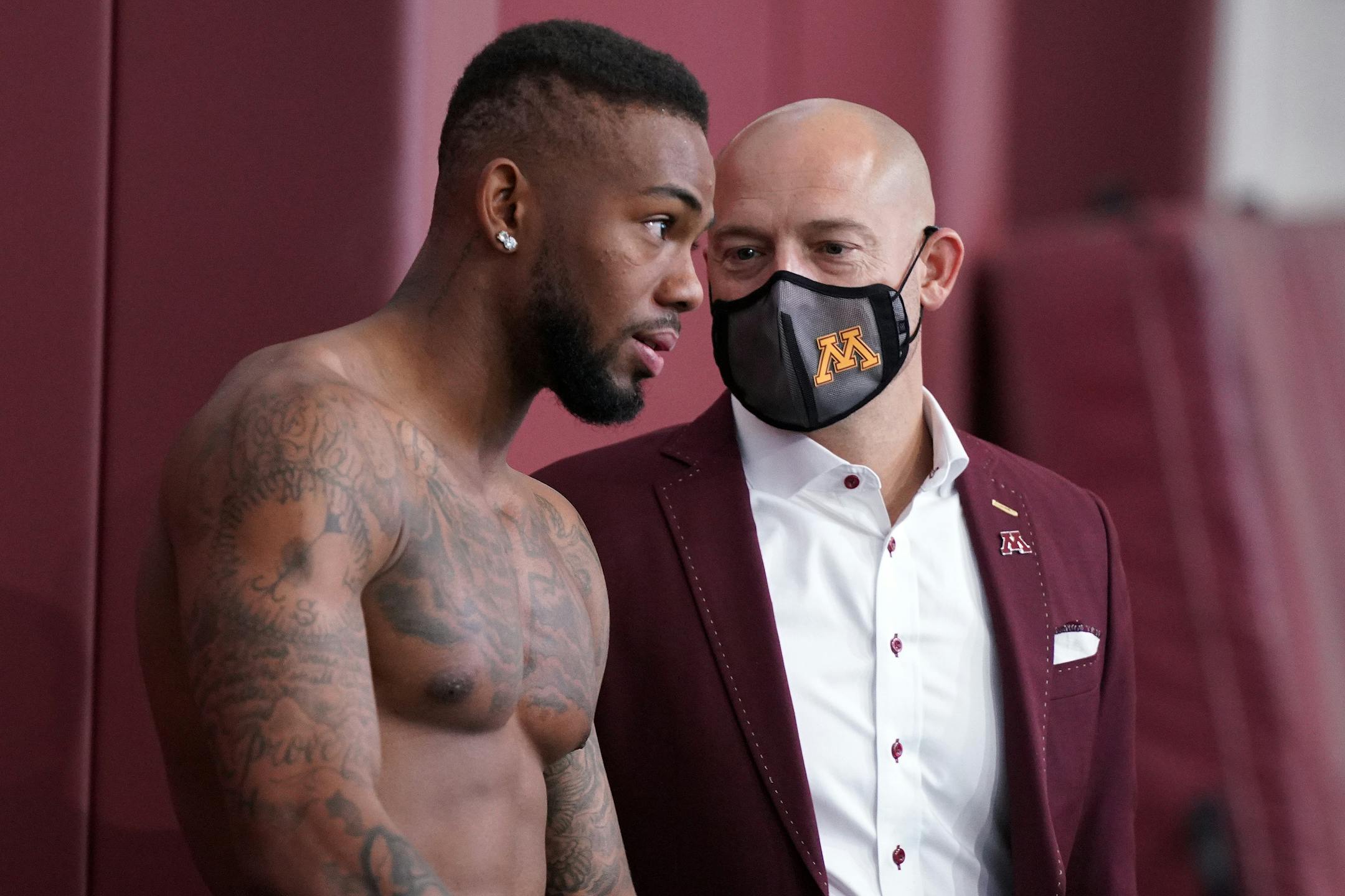 University of Minnesota head football coach P.J. Fleck talked with wide receiver Rashod Bateman during Pro Day.