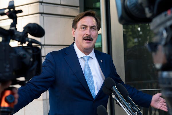 FILE - MyPillow chief executive Mike Lindell, speaks to reporters outside federal court in Washington, June 24, 2021. 
